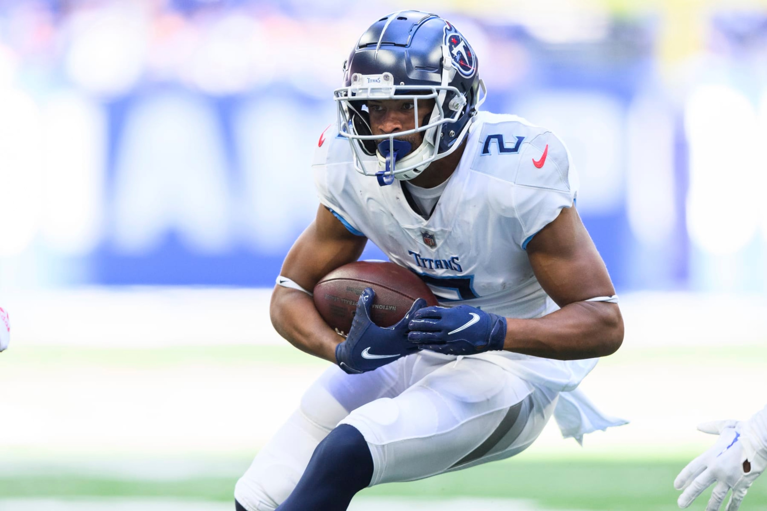 Tennessee Titans wide receiver Robert Woods (2) runs down the field after a catch during an NFL football game against the Indianapolis Colts, Sunday, Oct. 2, 2022, in Indianapolis. (AP Photo/Zach Bolinger)