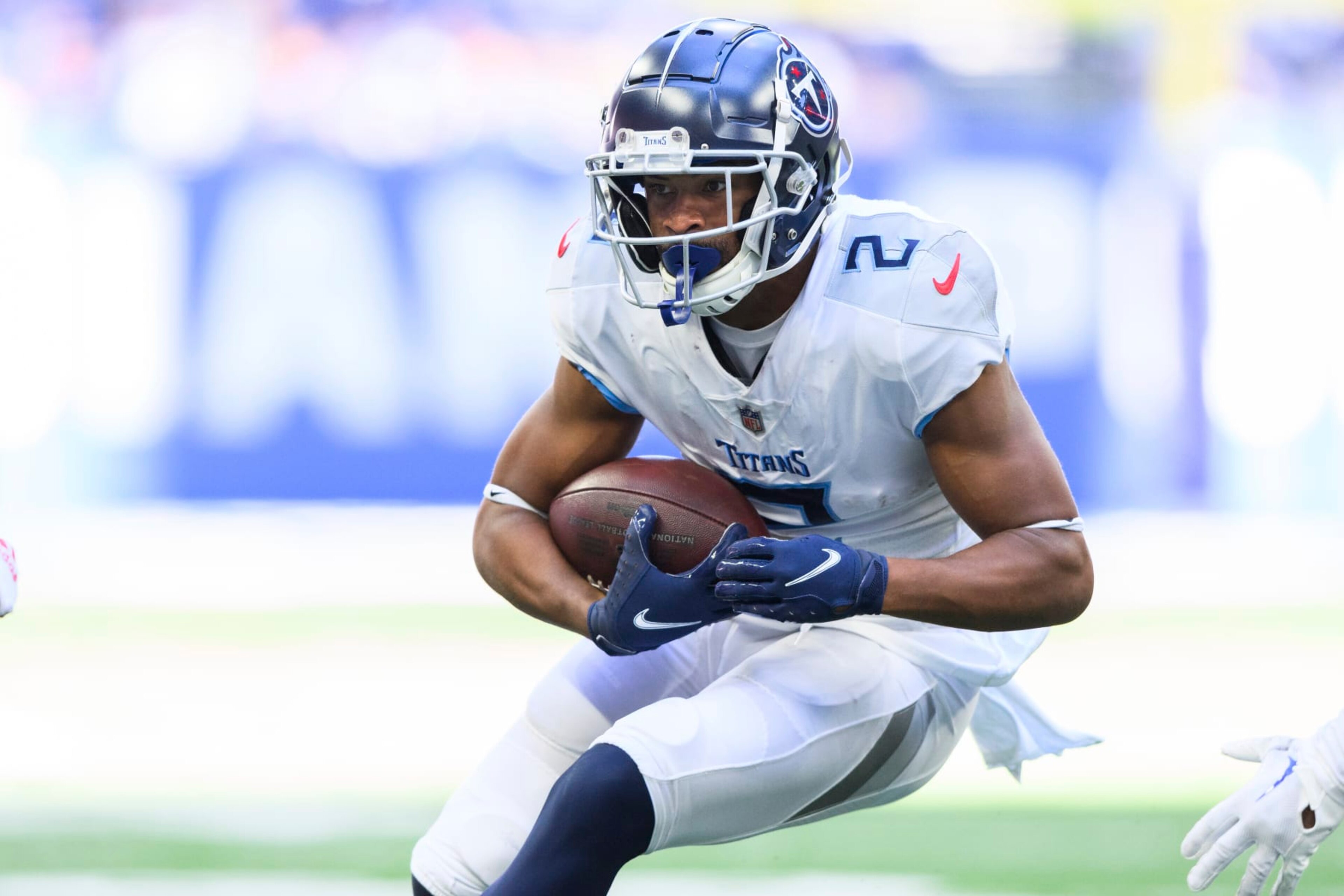 Tennessee Titans wide receiver Robert Woods (2) runs down the field after a catch during an NFL football game against the Indianapolis Colts, Sunday, Oct. 2, 2022, in Indianapolis. (AP Photo/Zach Bolinger)