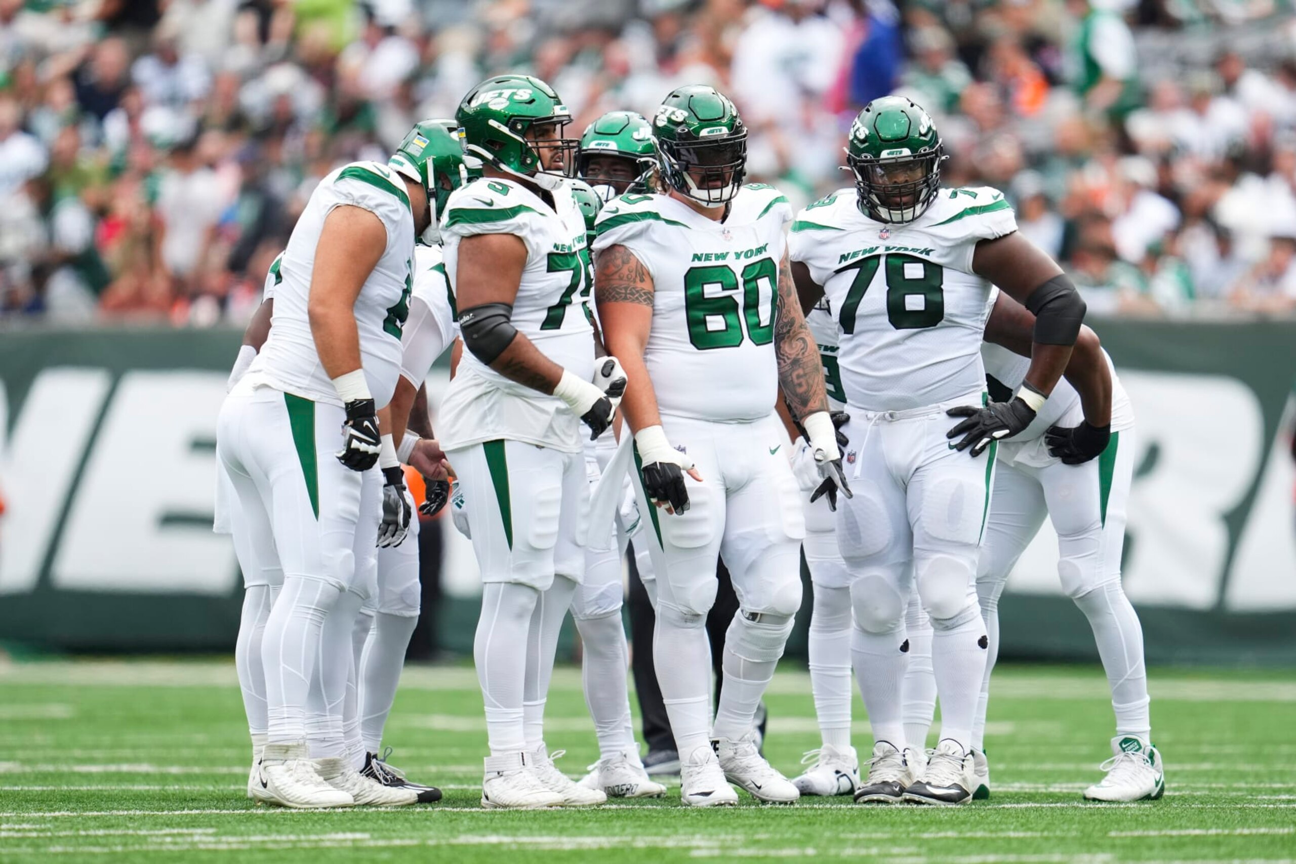 EAST RUTHERFORD, NJ - SEPTEMBER 25: New York Jets offensive line looks down field against the Cincinnati Bengals at MetLife Stadium on September 25, 2022 in East Rutherford, New Jersey. (Photo by Cooper Neill/Getty Images)