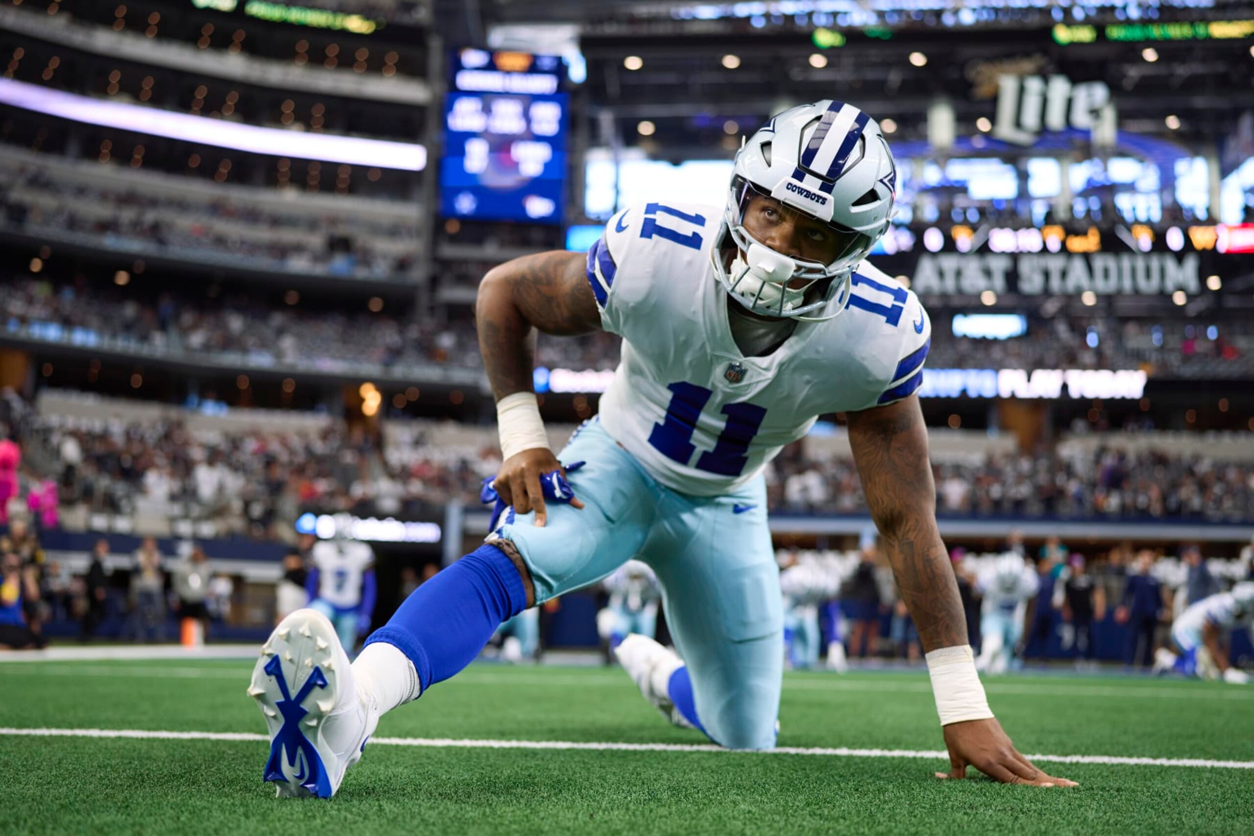 ARLINGTON, TX - OCTOBER 02: Micah Parsons #11 of the Dallas Cowboys warms up before kickoff against the Washington Commanders at AT&T Stadium on October 2, 2022 in Arlington, Texas. (Photo by Cooper Neill/Getty Images)