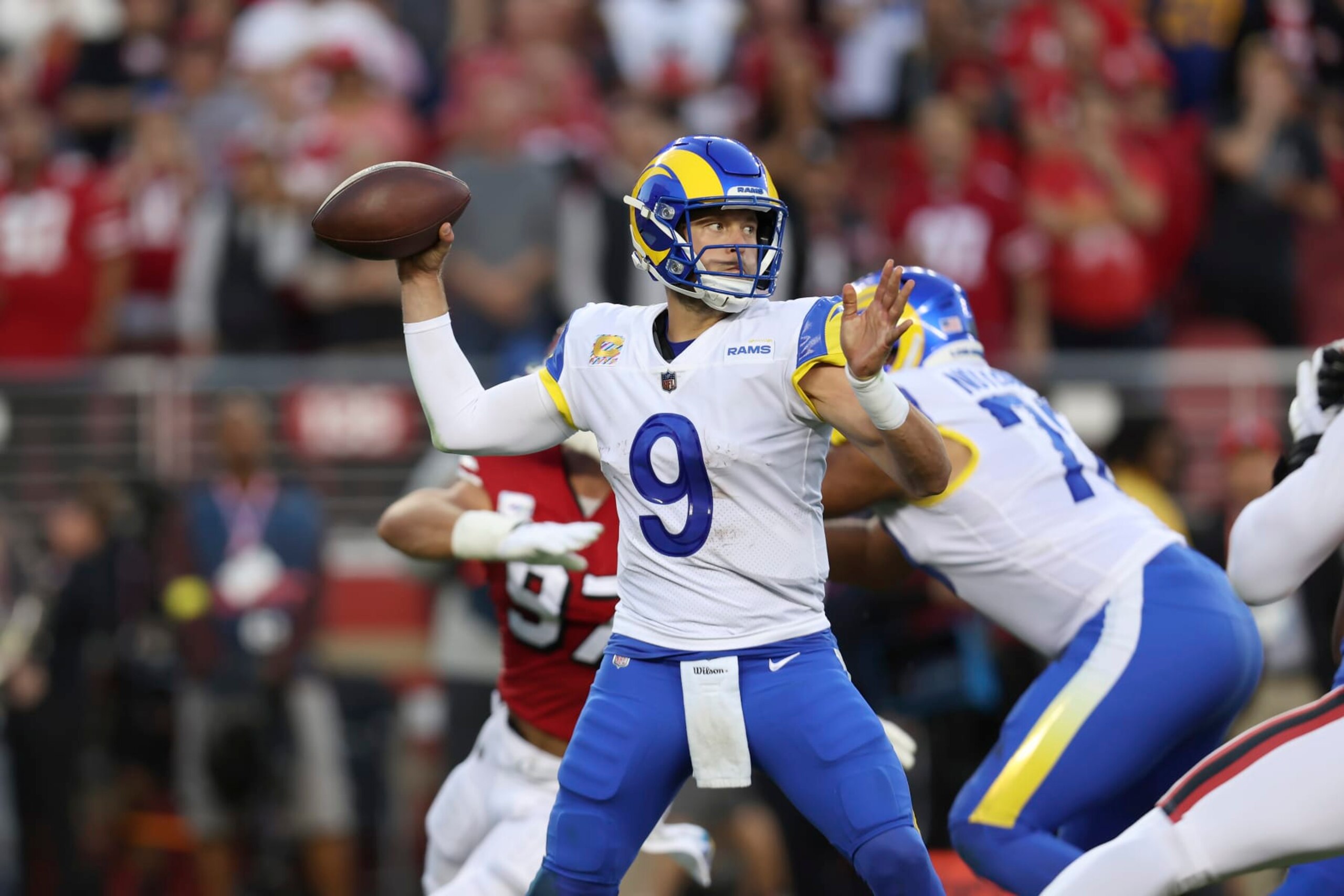 Los Angeles Rams quarterback Matthew Stafford (9) passes against the San Francisco 49ers during the first half of an NFL football game in Santa Clara, Calif., Monday, Oct. 3, 2022. (AP Photo/Jed Jacobsohn)