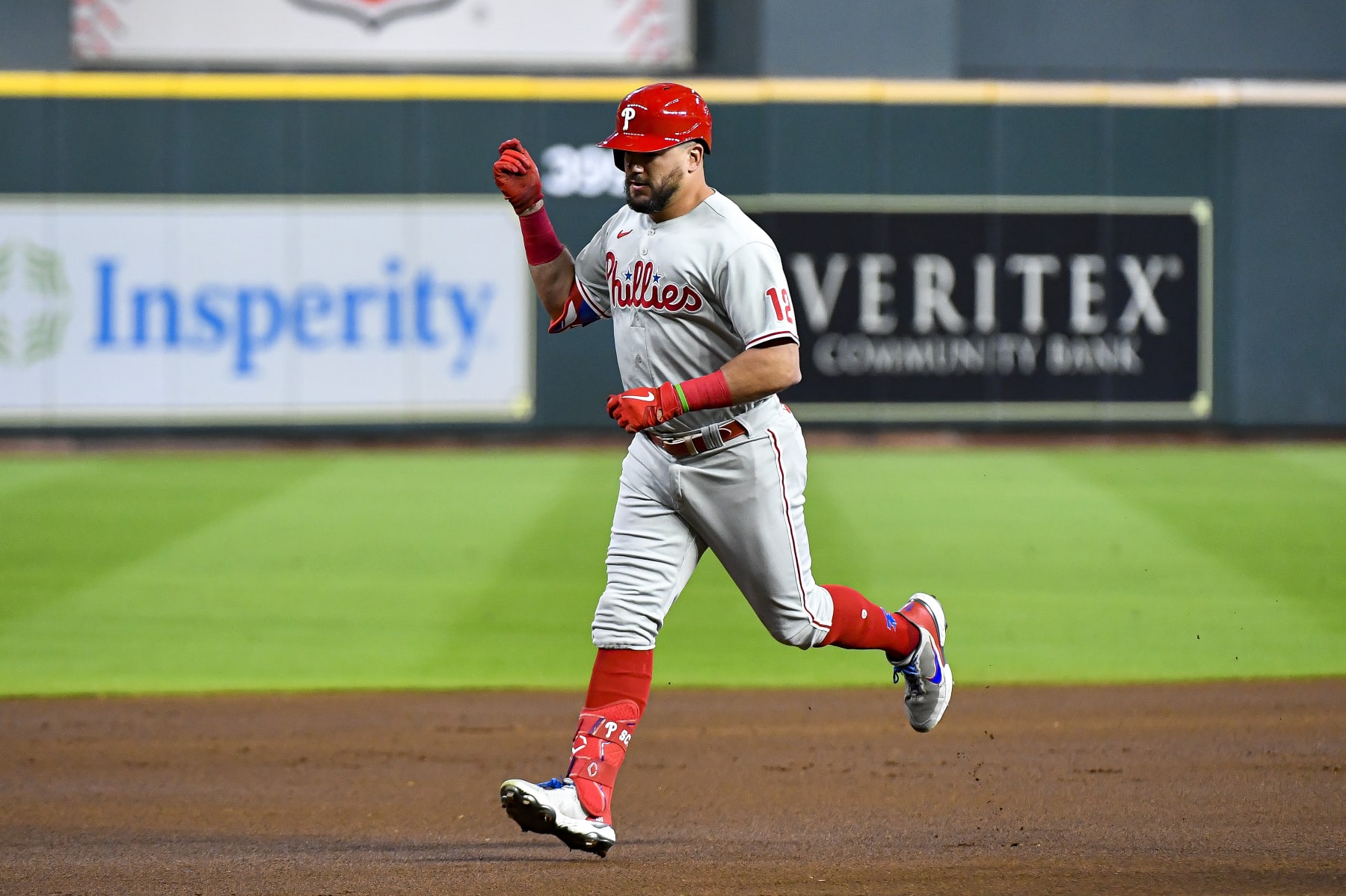 HOUSTON, TEXAS - OCTOBER 03: Kyle Schwarber #12 of the Philadelphia Phillies celebrates after hitting a solo home run in the first inning against the Houston Astros at Minute Maid Park on October 03, 2022 in Houston, Texas. (Photo by Logan Riely/Getty Images)