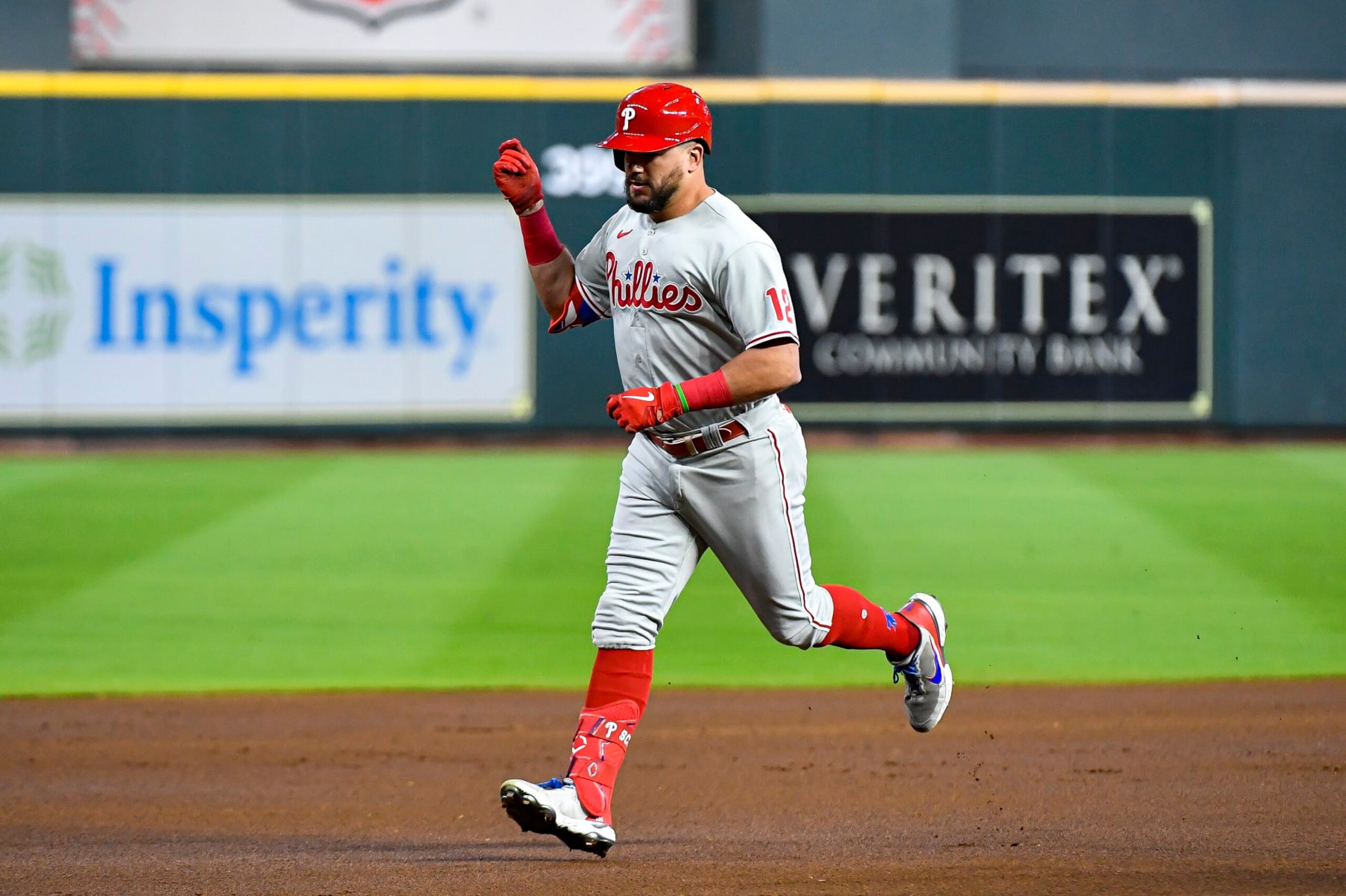 HOUSTON, TEXAS - OCTOBER 03: Kyle Schwarber #12 of the Philadelphia Phillies celebrates after hitting a solo home run in the first inning against the Houston Astros at Minute Maid Park on October 03, 2022 in Houston, Texas. (Photo by Logan Riely/Getty Images)