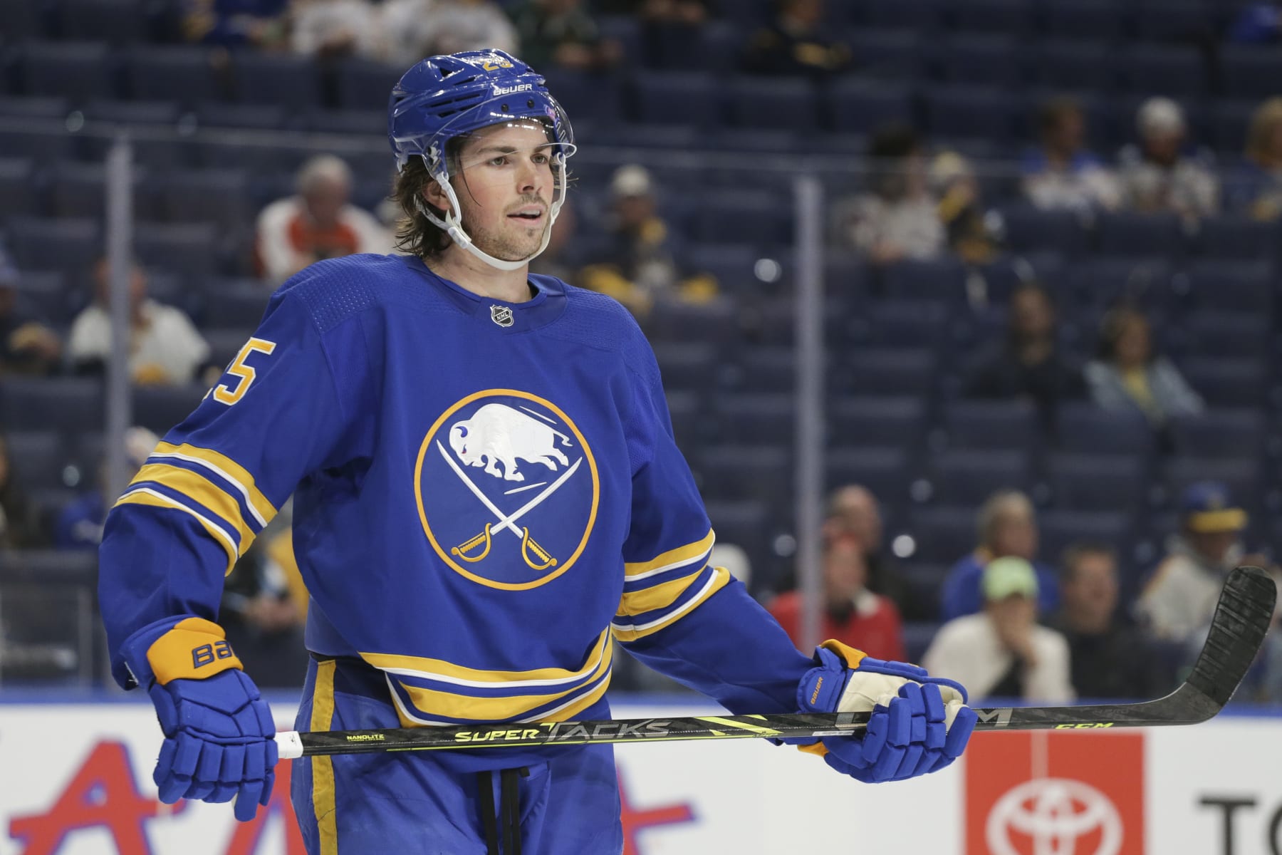 BUFFALO, NEW YORK - SEPTEMBER 27: Owen Power #25 of the Buffalo Sabres looks on during the second period against the Philadelphia Flyers at KeyBank Center on September 27, 2022 in Buffalo, New York. (Photo by Joshua Bessex/Getty Images)