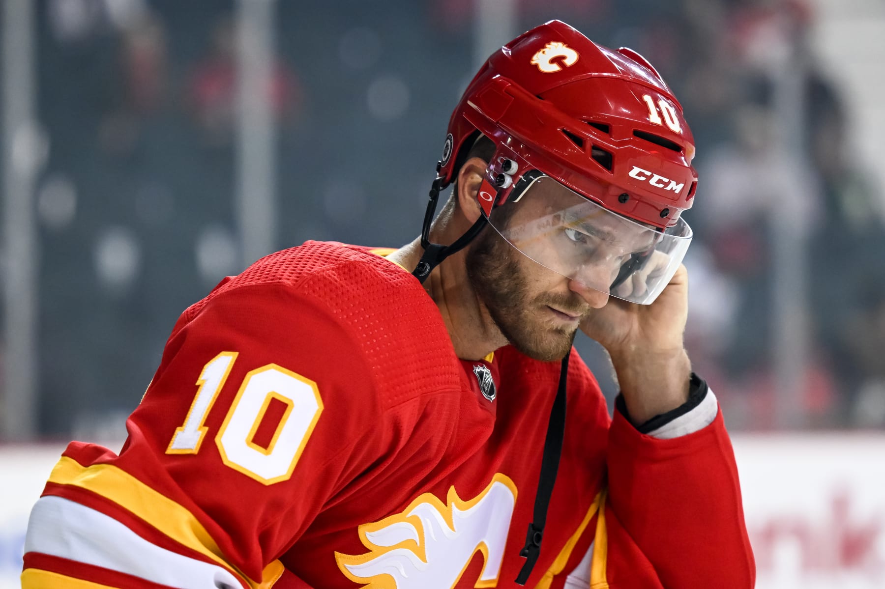 CALGARY, AB - SEPTEMBER 25: Calgary Flames Left Wing Jonathan Huberdeau (10) gets ready for the first period of an NHL pre-season game between the Calgary Flames and the Vancouver Canucks on September 25, 2022, at the Scotiabank Saddledome in Calgary, AB. (Photo by Brett Holmes/Icon Sportswire via Getty Images)