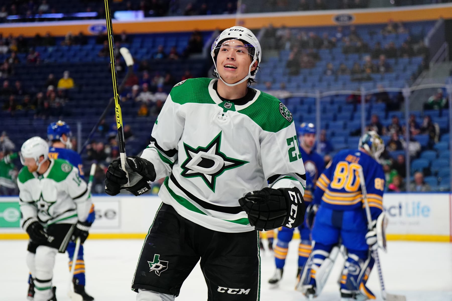 BUFFALO, NY - JANUARY 20: Jason Robertson #21 of the Dallas Stars celebrates his first period goal against Aaron Dell #80 of the Buffalo Sabres during an NHL game on January 20, 2022 at KeyBank Center in Buffalo, New York. (Photo by Ben Green/NHLI via Getty Images)