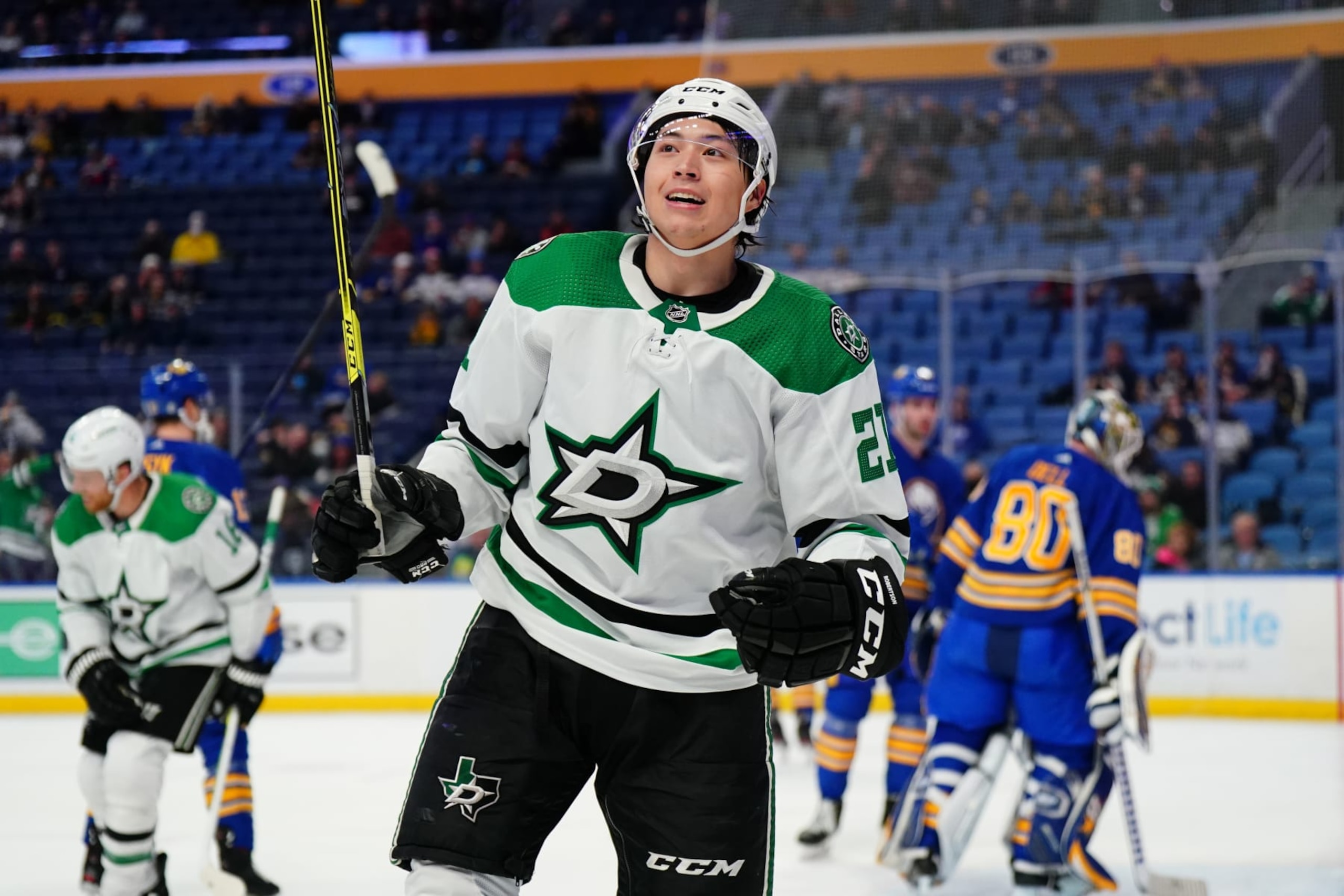 BUFFALO, NY - JANUARY 20: Jason Robertson #21 of the Dallas Stars celebrates his first period goal against Aaron Dell #80 of the Buffalo Sabres during an NHL game on January 20, 2022 at KeyBank Center in Buffalo, New York. (Photo by Ben Green/NHLI via Getty Images)