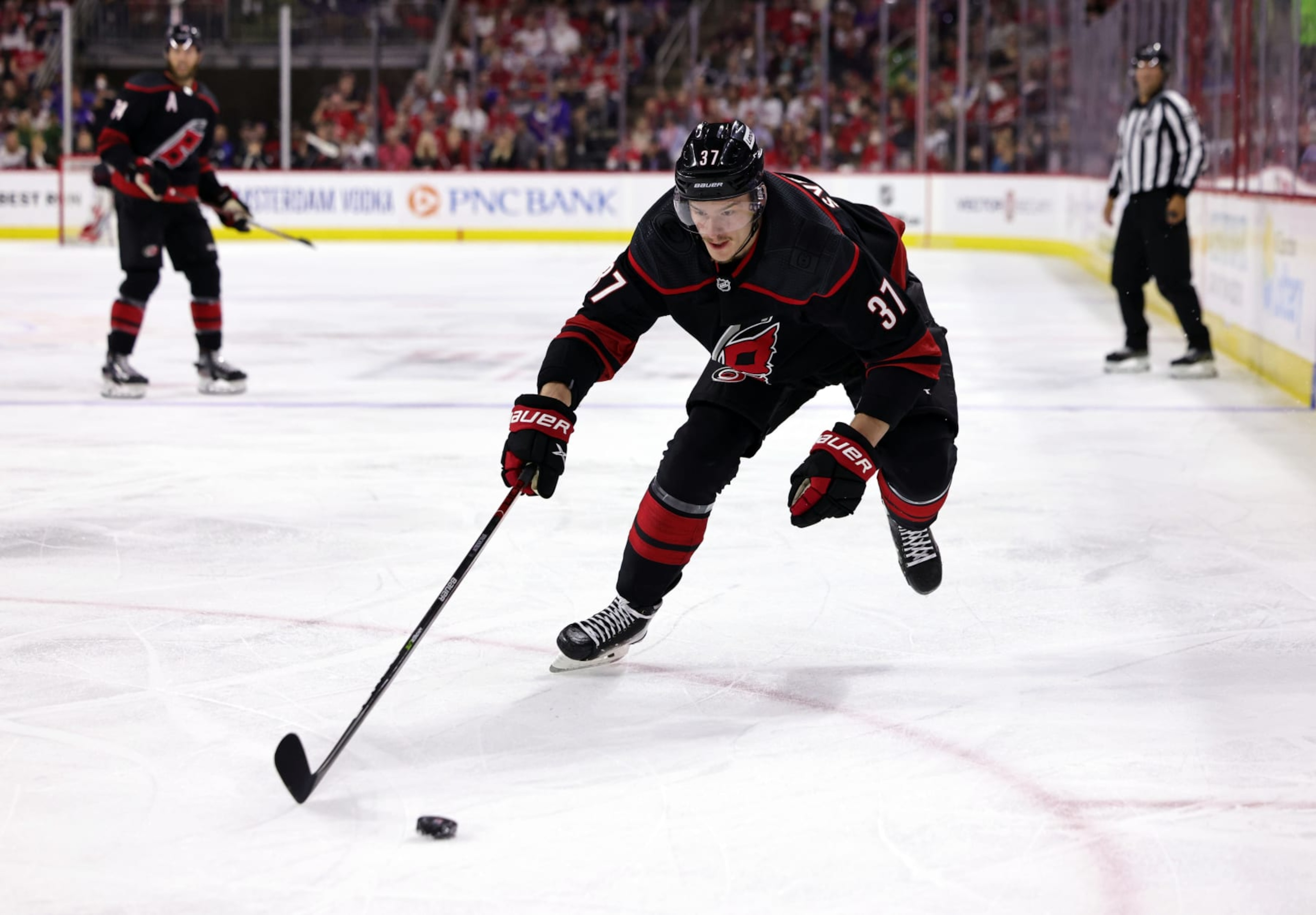 RALEIGH, NC - MAY 30: Andrei Svechnikov #37 of the Carolina Hurricanes skates with the puck in Game Seven of the Second Round of the 2022 Stanley Cup Playoffs against the New York Rangers on May 30, 2022 at PNC Arena in Raleigh, North Carolina (Photo by Gregg Forwerck/NHLI via Getty Images) RALEIGH, NC - MAY 30: Andrei Svechnikov #37 of the Carolina Hurricanes skates with the puck in Game Seven of the Second Round of the 2022 Stanley Cup Playoffs against the New York Rangers on May 30, 2022 at PNC Arena in Raleigh, North Carolina (Photo by Gregg Forwerck/NHLI via Getty Images)