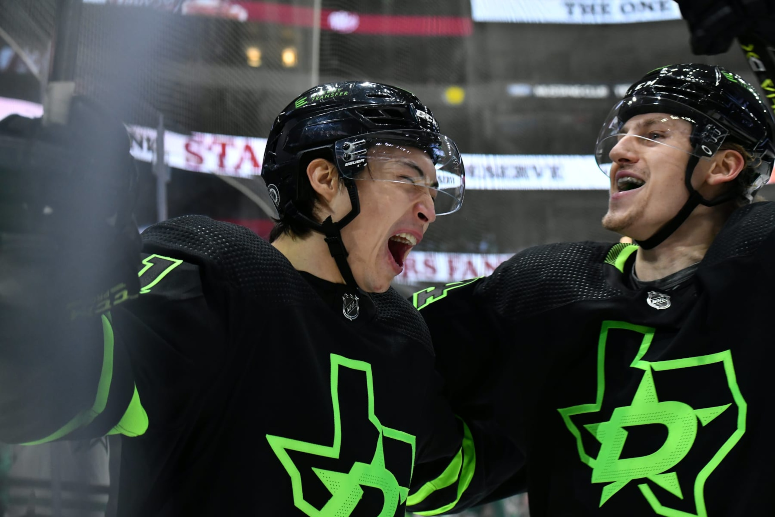 DALLAS, TX - DECEMBER 2: Jason Robertson #21 and Roope Hintz #24 of the Dallas Stars celebrate a goal against the Columbus Blue Jackets at the American Airlines Center on December 2, 2021 in Dallas, Texas. (Photo by Glenn James/NHLI via Getty Images)