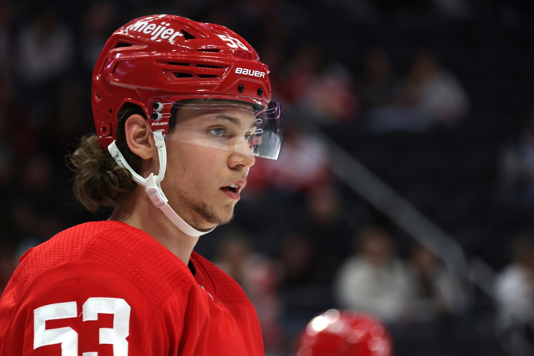 DETROIT, MICHIGAN - SEPTEMBER 28: Moritz Seider #53 of the Detroit Red Wings looks on in the second period while playing the Chicago Blackhawks at Little Caesars Arena on September 28, 2022 in Detroit, Michigan. (Photo by Gregory Shamus/Getty Images)