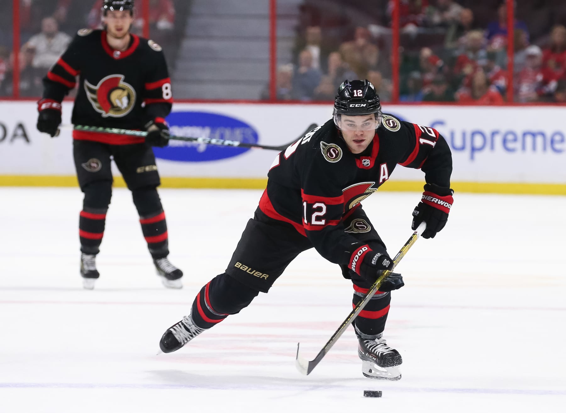 OTTAWA, ONTARIO - OCTOBER 01: Alex DeBrincat #12  of the Ottawa Senators skates with the puck against the Montreal Canadiens in the first period at Canadian Tire Centre on October 01, 2022 in Ottawa, Ontario. (Photo by Chris Tanouye/Getty Images)