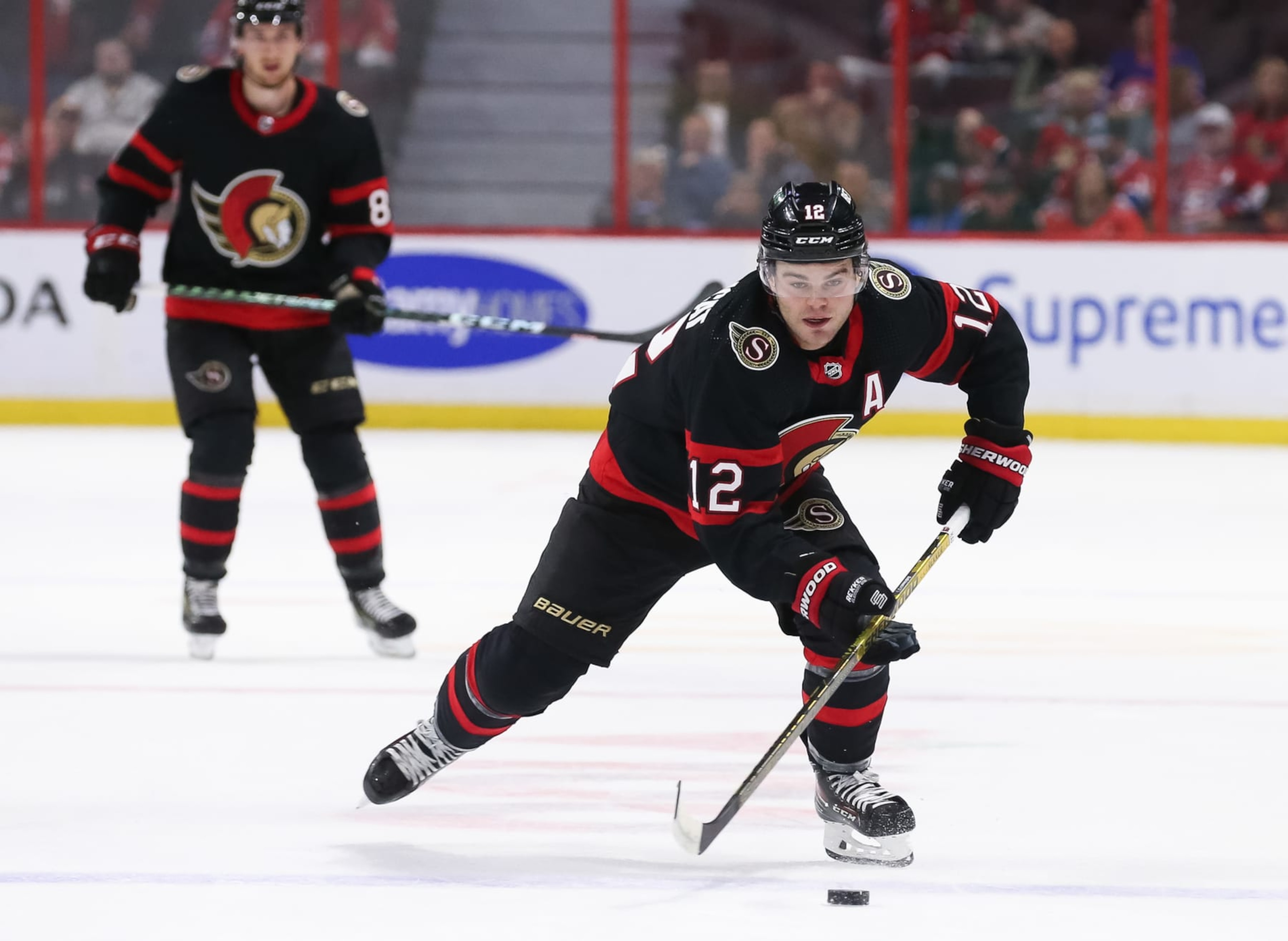 OTTAWA, ONTARIO - OCTOBER 01: Alex DeBrincat #12 of the Ottawa Senators skates with the puck against the Montreal Canadiens in the first period at Canadian Tire Centre on October 01, 2022 in Ottawa, Ontario. (Photo by Chris Tanouye/Getty Images) OTTAWA, ONTARIO - OCTOBER 01: Alex DeBrincat #12 of the Ottawa Senators skates with the puck against the Montreal Canadiens in the first period at Canadian Tire Centre on October 01, 2022 in Ottawa, Ontario. (Photo by Chris Tanouye/Getty Images)