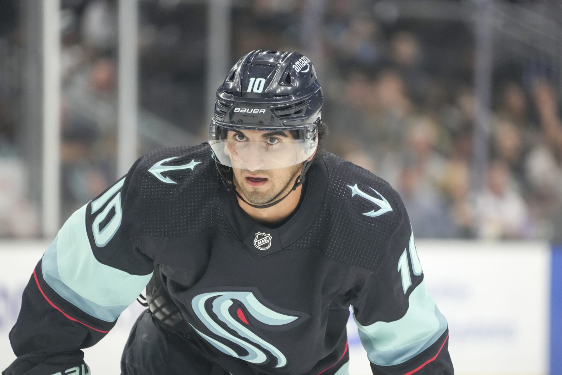 SEATTLE, WA - OCTOBER 01: Seattle Kraken center Matty Beniers (10) looks on during an NHL pre-season game between the Vancouver Canucks and the Seattle Kraken on October 1, 2022 at Climate Pledge Arena in Seattle, WA.  (Photo by Jeff Halstead/Icon Sportswire via Getty Images)