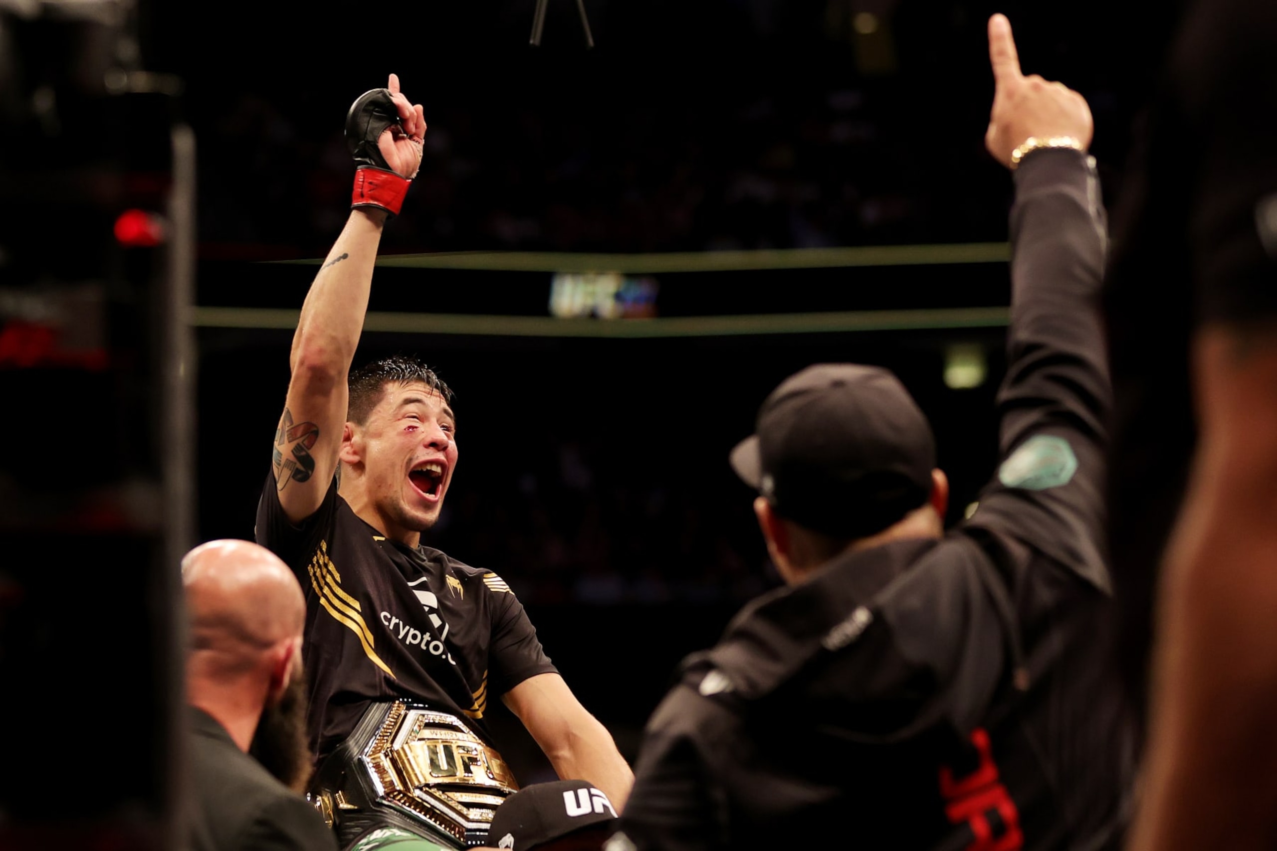 DALLAS, TEXAS - JULY 30: Brandon Moreno of Mexico celebrates with the flyweight interim title belt after knocking out Kai Kara France of New Zealand in the third round during UFC 277 at American Airlines Center on July 30, 2022 in Dallas, Texas. (Photo by Carmen Mandato/Getty Images) DALLAS, TEXAS - JULY 30: Brandon Moreno of Mexico celebrates with the flyweight interim title belt after knocking out Kai Kara France of New Zealand in the third round during UFC 277 at American Airlines Center on July 30, 2022 in Dallas, Texas. (Photo by Carmen Mandato/Getty Images)