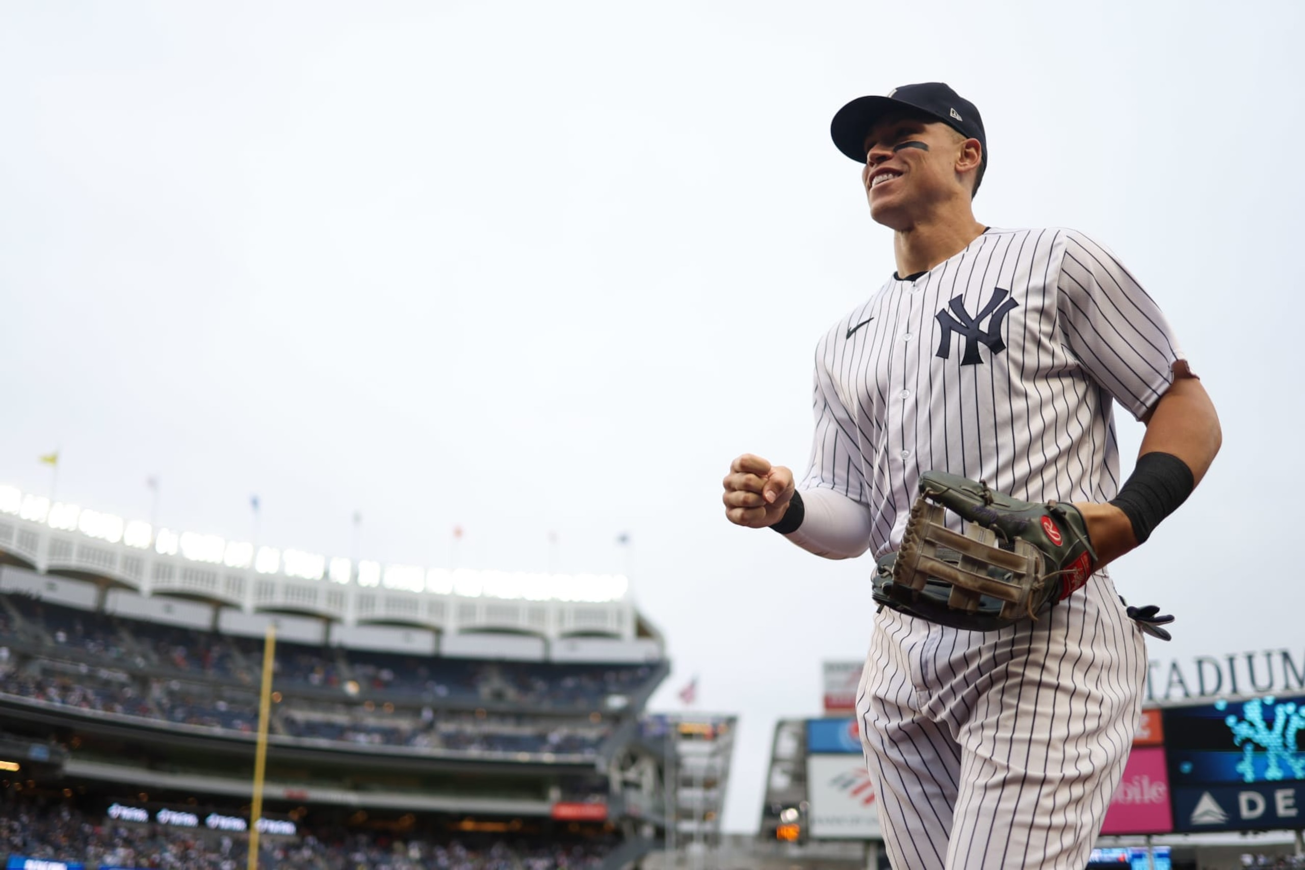 NEW YORK, NY - OCTOBER 01:   Aaron Judge #99 of the New York Yankees returns to the dugout during the game between the Baltimore Orioles and the New York Yankees at Yankee Stadium on Saturday, October 1, 2022 in New York, New York. (Photo by Rob Tringali/MLB Photos via Getty Images)