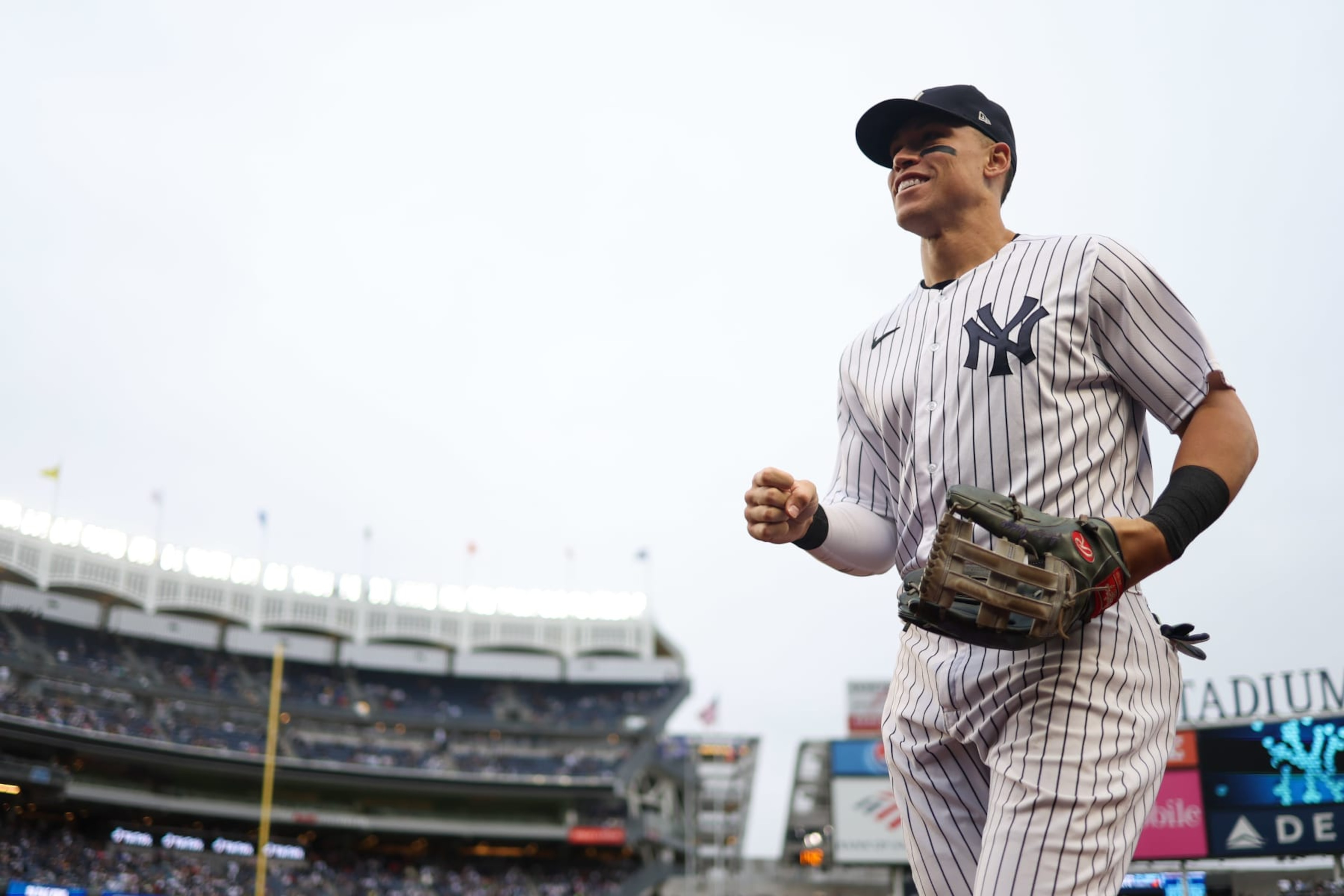 NEW YORK, NY - OCTOBER 01:   Aaron Judge #99 of the New York Yankees returns to the dugout during the game between the Baltimore Orioles and the New York Yankees at Yankee Stadium on Saturday, October 1, 2022 in New York, New York. (Photo by Rob Tringali/MLB Photos via Getty Images)