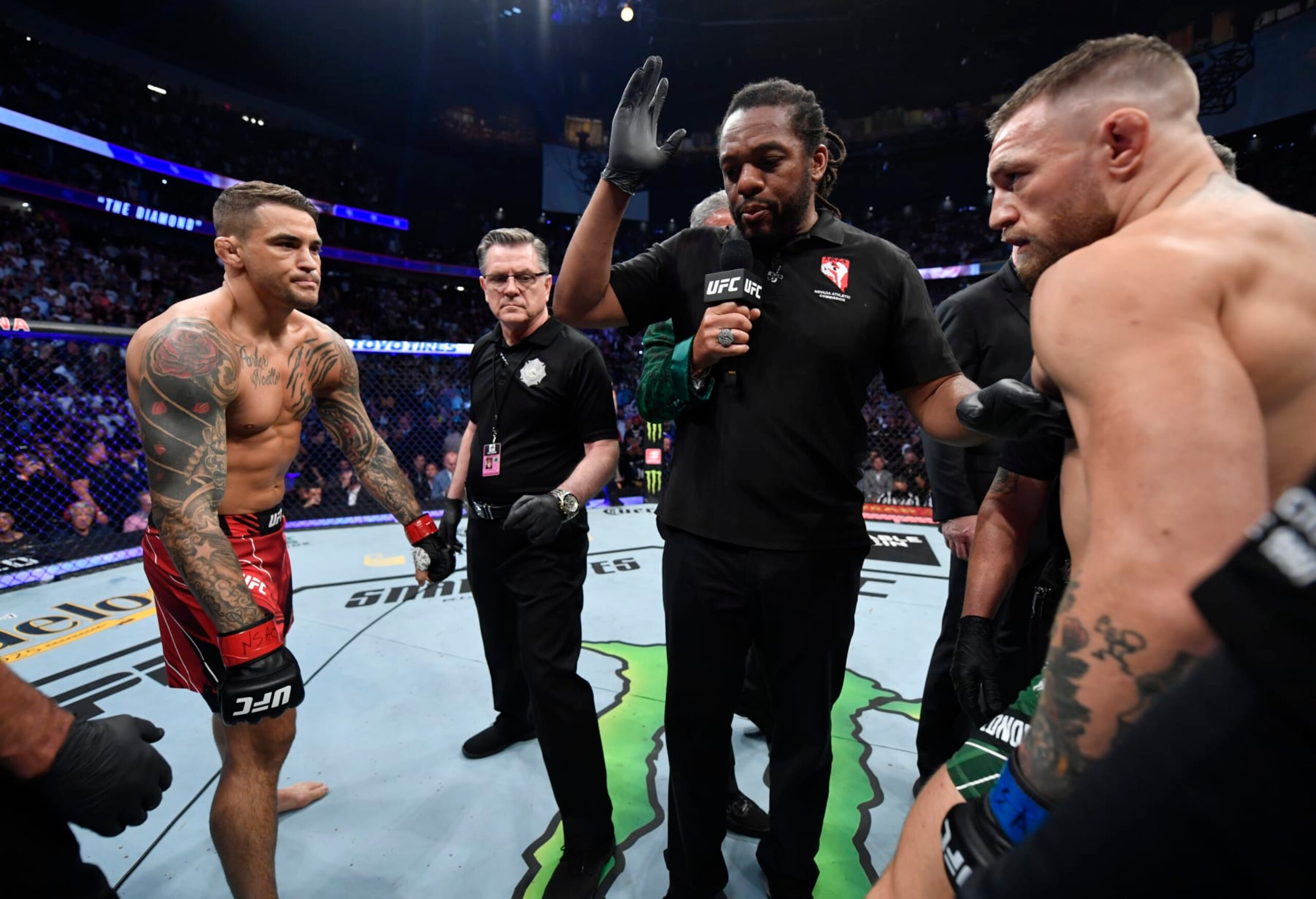 LAS VEGAS, NEVADA - JULY 10: (L-R) Opponents Dustin Poirier and Conor McGregor of Ireland face off prior to their welterweight fight during the UFC 264 event at T-Mobile Arena on July 10, 2021 in Las Vegas, Nevada. (Photo by Jeff Bottari/Zuffa LLC) LAS VEGAS, NEVADA - JULY 10: (L-R) Opponents Dustin Poirier and Conor McGregor of Ireland face off prior to their welterweight fight during the UFC 264 event at T-Mobile Arena on July 10, 2021 in Las Vegas, Nevada. (Photo by Jeff Bottari/Zuffa LLC)