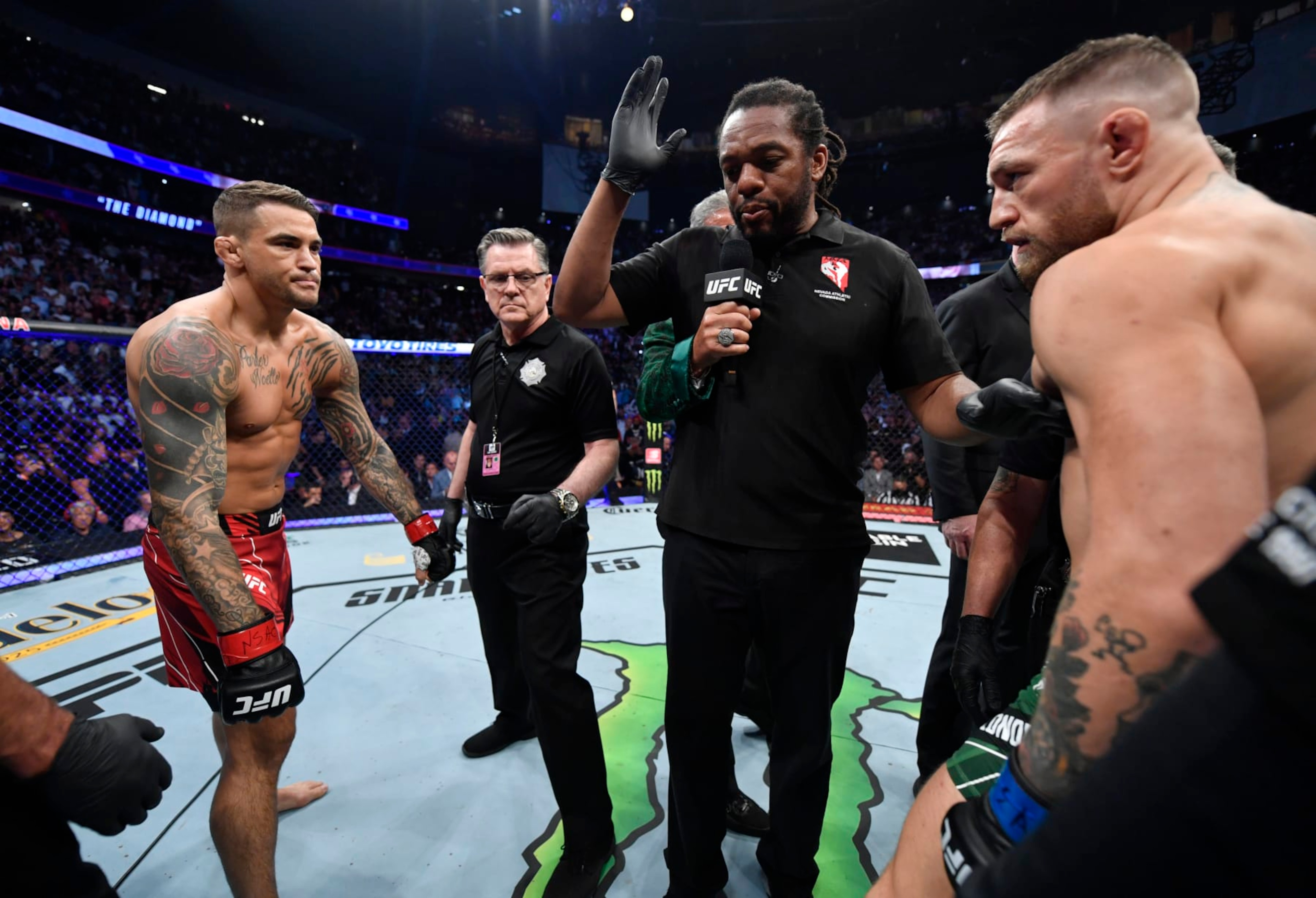 LAS VEGAS, NEVADA - JULY 10: (L-R) Opponents Dustin Poirier and Conor McGregor of Ireland face off prior to their welterweight fight during the UFC 264 event at T-Mobile Arena on July 10, 2021 in Las Vegas, Nevada. (Photo by Jeff Bottari/Zuffa LLC)