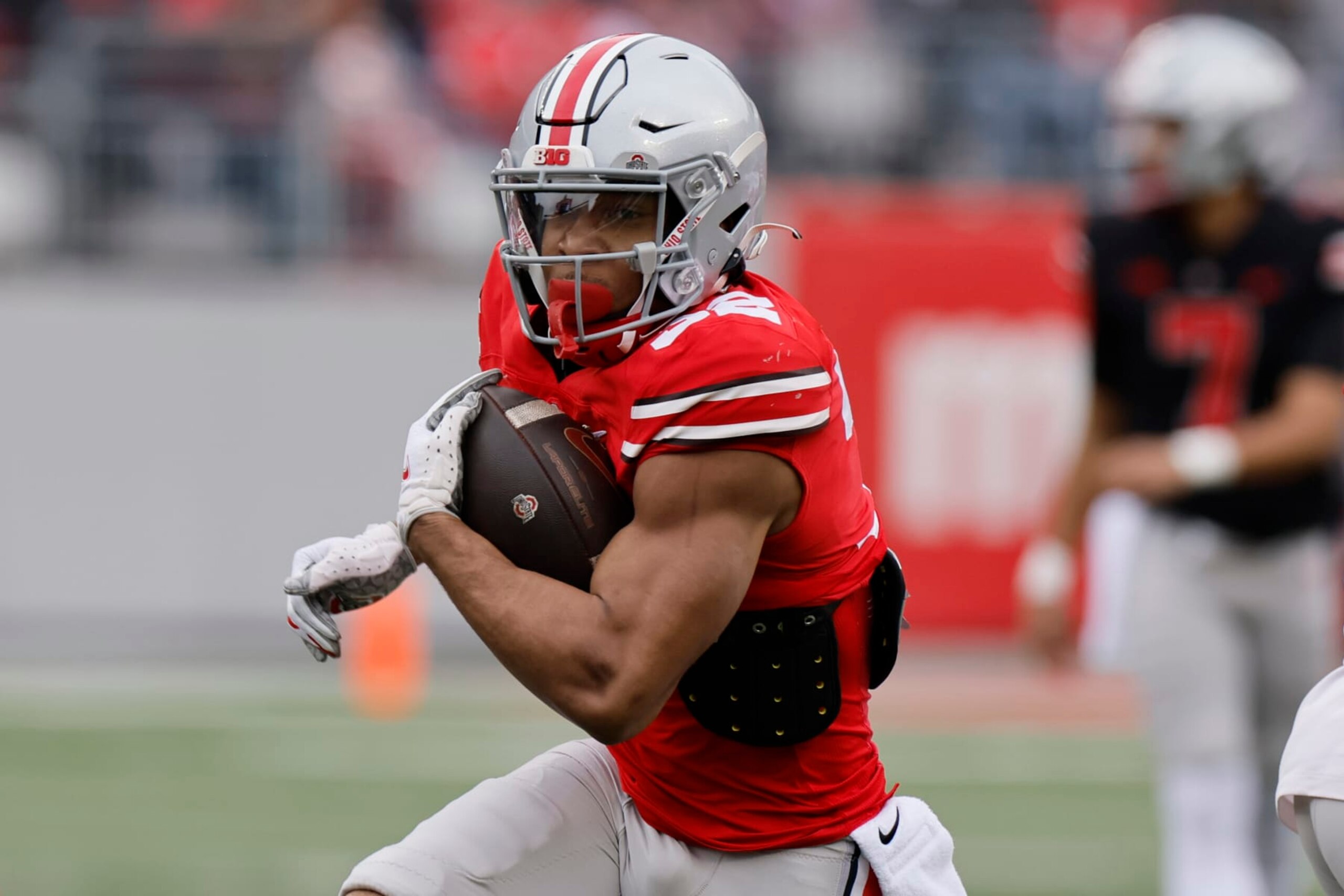 FILE - Ohio State running back TreVeyon Henderson plays in an NCAA college spring football game Saturday, April 16, 2022, in Columbus, Ohio. Henderson was selected to The Associated Press preseason All-America team, Monday, Aug. 22, 2022. (AP Photo/Jay LaPrete, File)