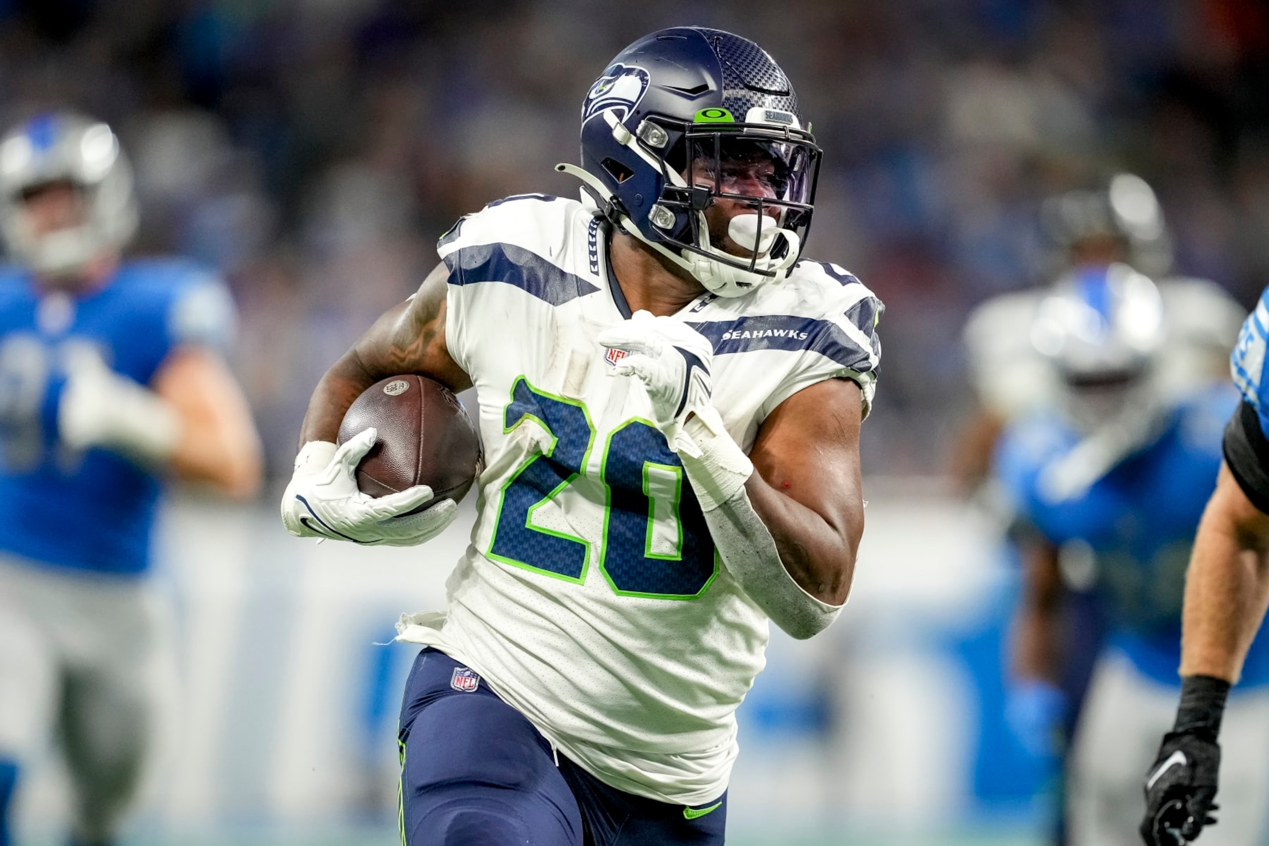 DETROIT, MICHIGAN - OCTOBER 02: Rashaad Penny #20 of the Seattle Seahawks runs the ball against the Detroit Lions at Ford Field on October 2, 2022 in Detroit, Michigan. (Photo by Nic Antaya/Getty Images)
