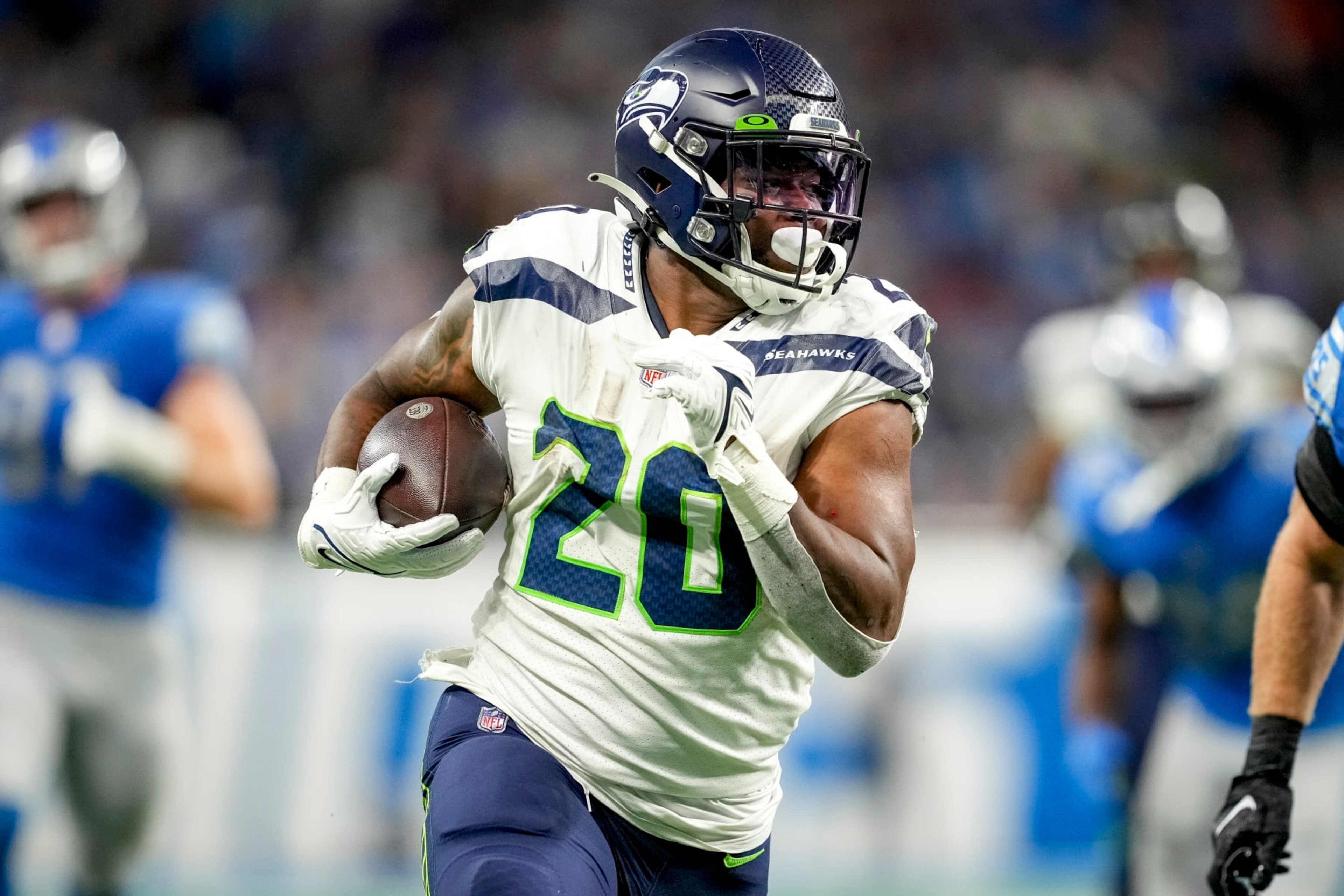 DETROIT, MICHIGAN - OCTOBER 02: Rashaad Penny #20 of the Seattle Seahawks runs the ball against the Detroit Lions at Ford Field on October 2, 2022 in Detroit, Michigan. (Photo by Nic Antaya/Getty Images)