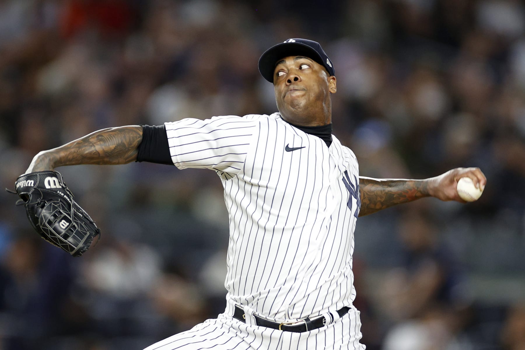 NEW YORK, NEW YORK - SEPTEMBER 22: Aroldis Chapman #54 of the New York Yankees pitches during the eighth inning against the Boston Red Sox at Yankee Stadium on September 22, 2022 in the Bronx borough of New York City. (Photo by Sarah Stier/Getty Images)