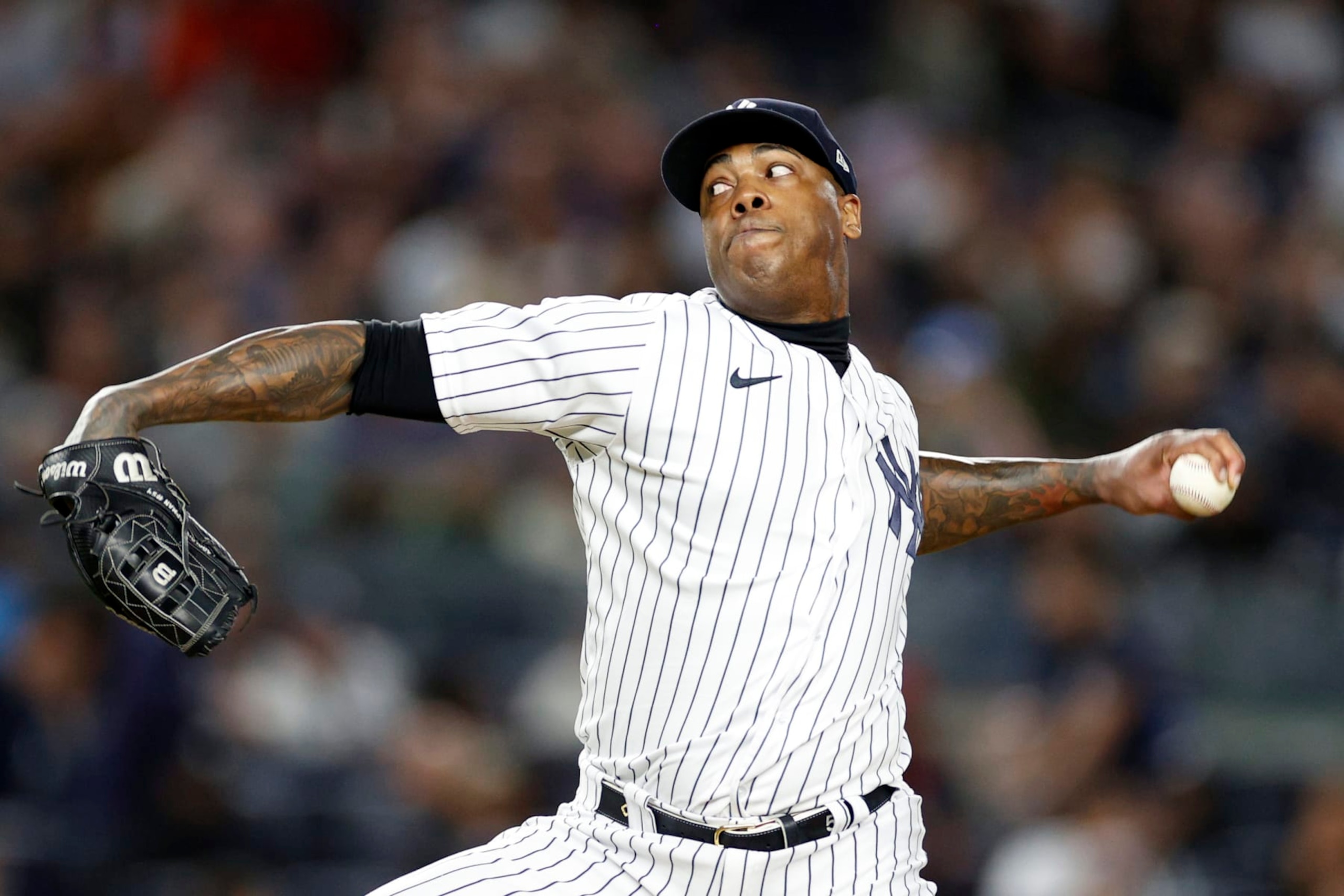 NEW YORK, NEW YORK - SEPTEMBER 22: Aroldis Chapman #54 of the New York Yankees pitches during the eighth inning against the Boston Red Sox at Yankee Stadium on September 22, 2022 in the Bronx borough of New York City. (Photo by Sarah Stier/Getty Images)