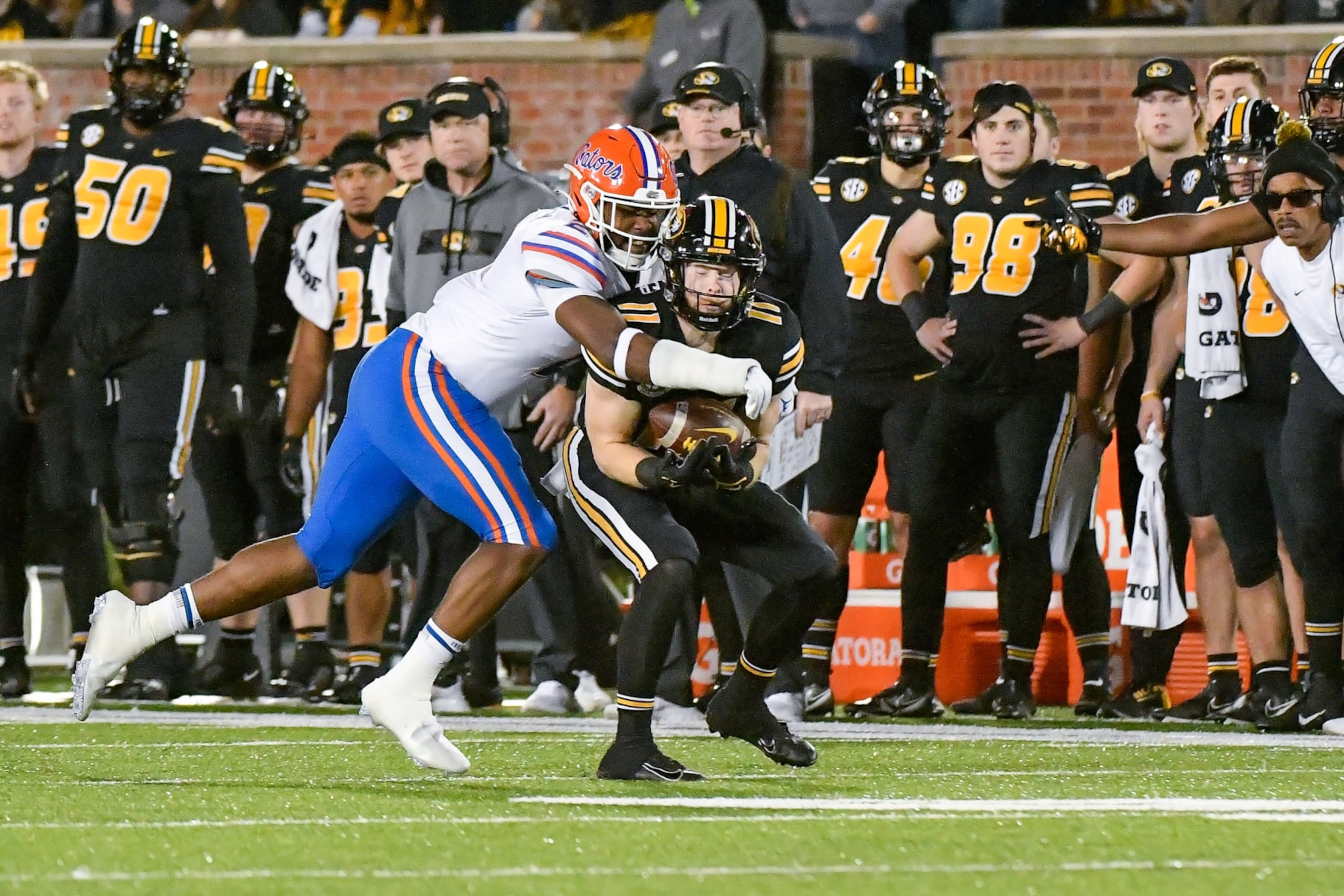 COLUMBIA, MO - NOVEMBER 20: Missouri Tigers wide receiver Barrett Banister (11) makes the catch despite the defense of Florida Gators linebacker Amari Burney (2) during a game between the Florida Gators and the Missouri Tigers on November 20, 2021, at Faurot Field at Memorial Stadium in Columbia MO (Photo by Rick Ulreich/Icon Sportswire via Getty Images)