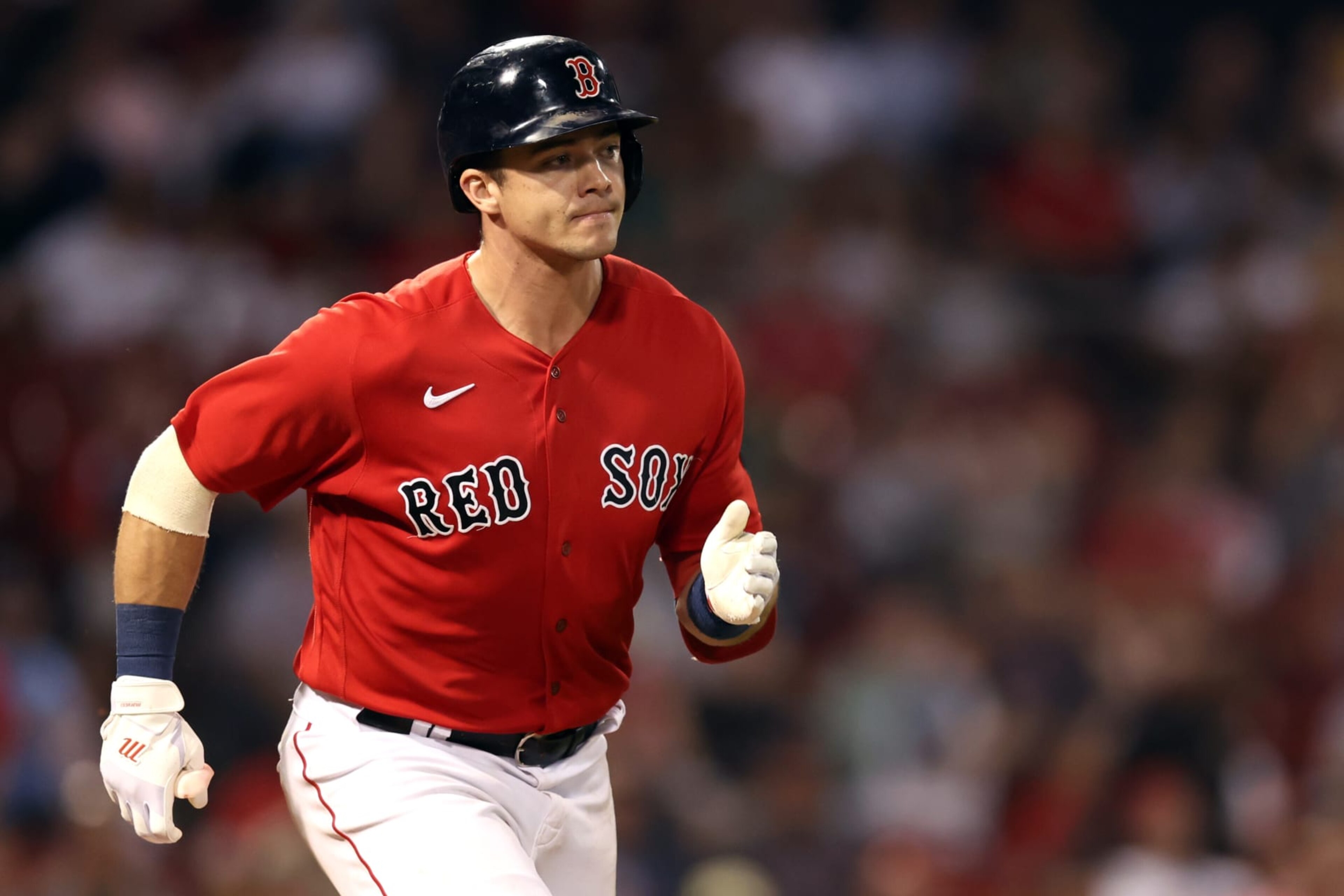 BOSTON, MASSACHUSETTS - AUGUST 26: Bobby Dalbec #29 of the Boston Red Sox runs towards first base during the eighth inning against the Tampa Bay Rays at Fenway Park on August 26, 2022 in Boston, Massachusetts. (Photo by Maddie Meyer/Getty Images)