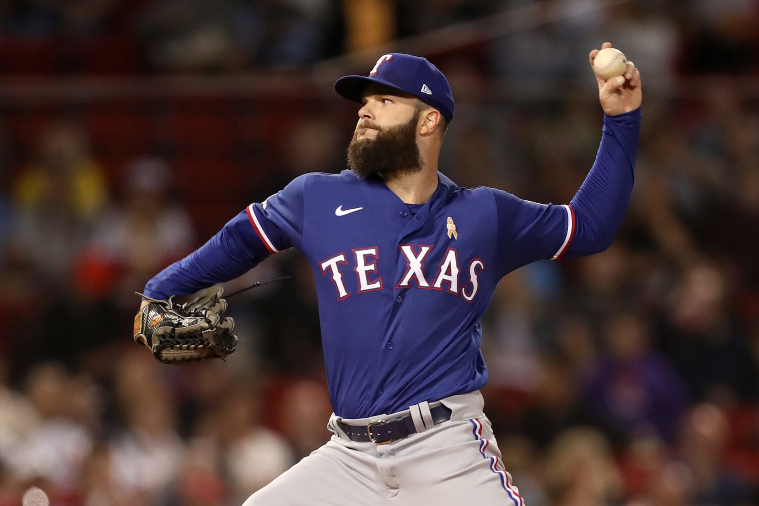BOSTON, MASSACHUSETTS - SEPTEMBER 02: Dallas Keuchel #60 of the Texas Rangers delivers a pitch during the second inning against the Boston Red Sox at Fenway Park on September 02, 2022 in Boston, Massachusetts. (Photo by Paul Rutherford/Getty Images)