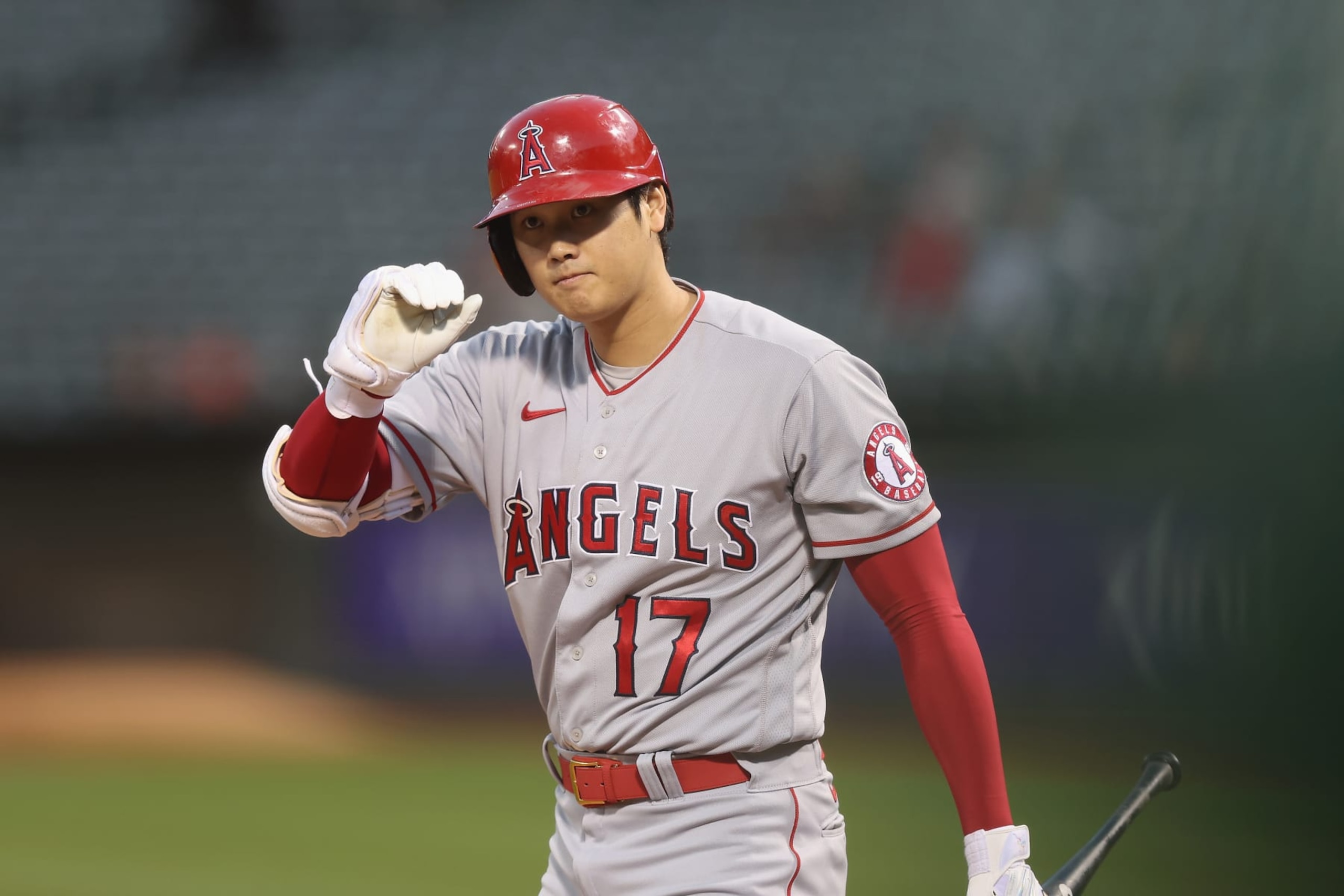 OAKLAND, CALIFORNIA - OCTOBER 04: Shohei Ohtani #17 of the Los Angeles Angels walks to the plate to bat in the top of the first inning against the Oakland Athletics at RingCentral Coliseum on October 04, 2022 in Oakland, California. (Photo by Lachlan Cunningham/Getty Images)