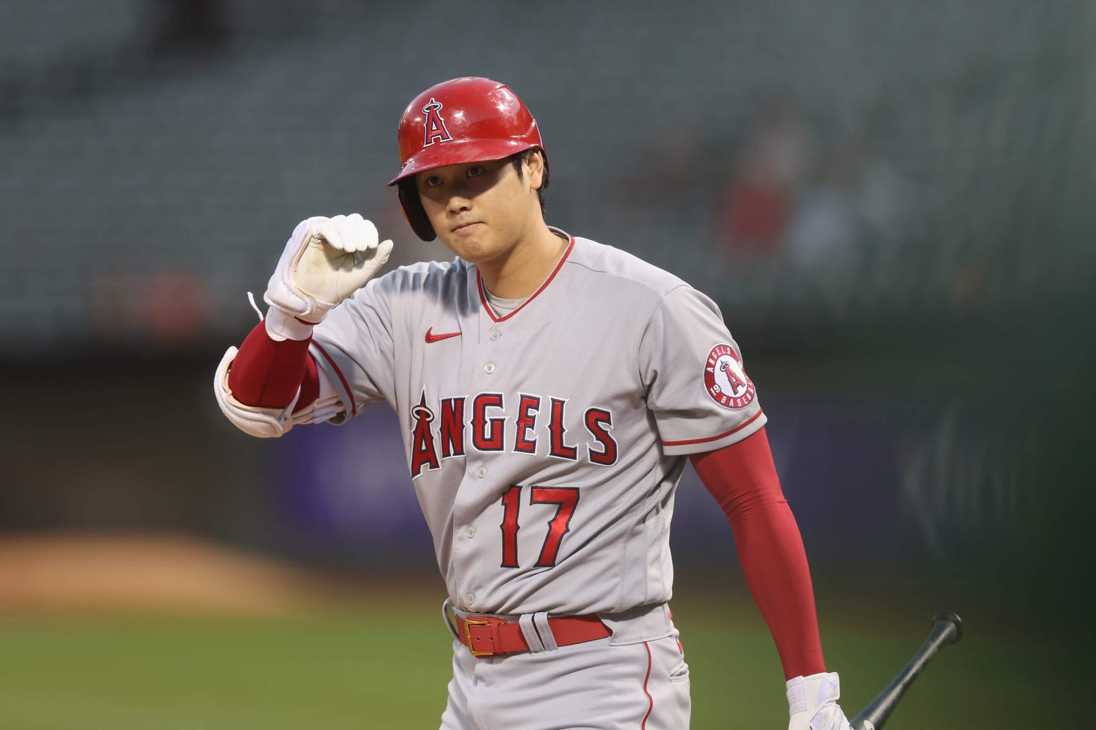 OAKLAND, CALIFORNIA - OCTOBER 04: Shohei Ohtani #17 of the Los Angeles Angels walks to the plate to bat in the top of the first inning against the Oakland Athletics at RingCentral Coliseum on October 04, 2022 in Oakland, California. (Photo by Lachlan Cunningham/Getty Images)