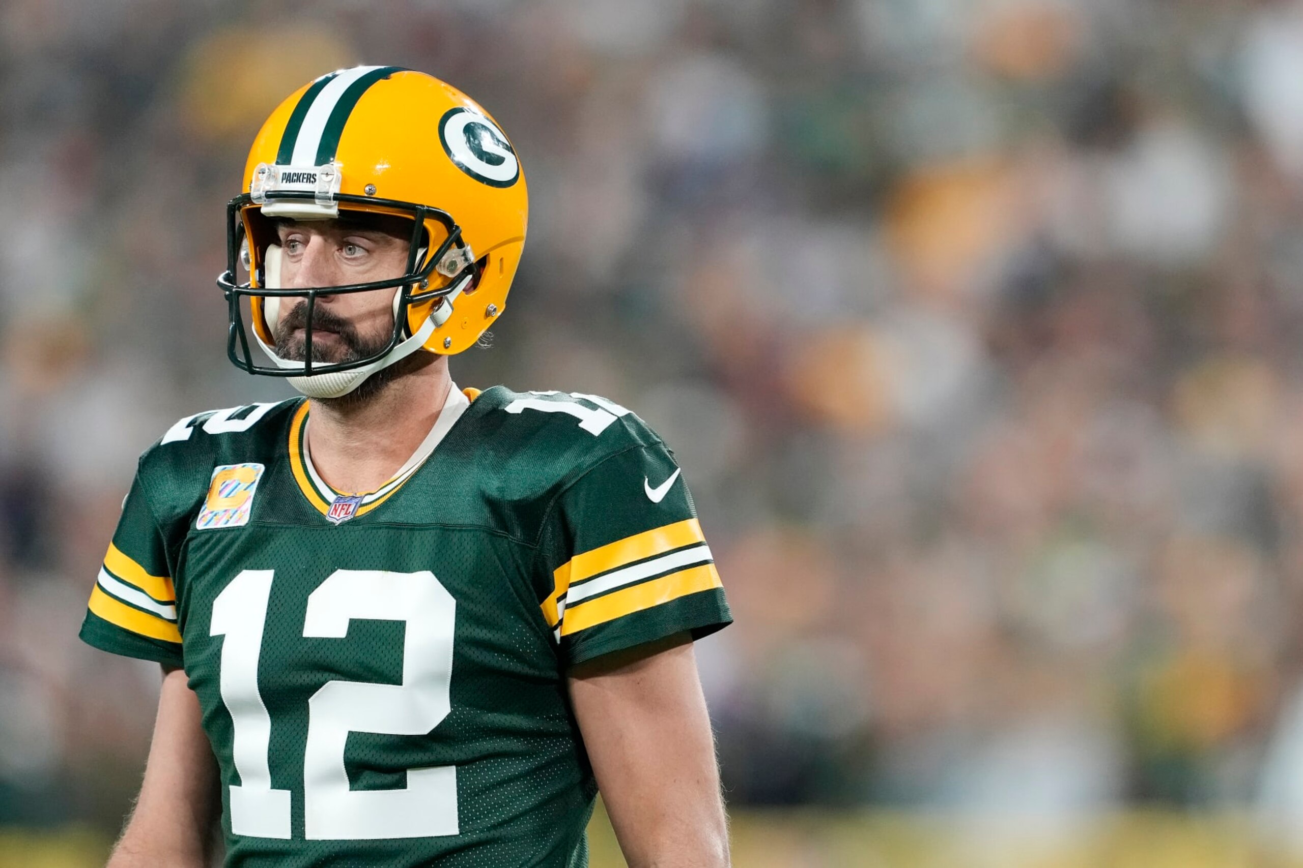 GREEN BAY, WISCONSIN - OCTOBER 02: Aaron Rodgers #12 of the Green Bay Packers reacts after a play in overtime against the New England Patriots at Lambeau Field on October 02, 2022 in Green Bay, Wisconsin. (Photo by Patrick McDermott/Getty Images) GREEN BAY, WISCONSIN - OCTOBER 02: Aaron Rodgers #12 of the Green Bay Packers reacts after a play in overtime against the New England Patriots at Lambeau Field on October 02, 2022 in Green Bay, Wisconsin. (Photo by Patrick McDermott/Getty Images)