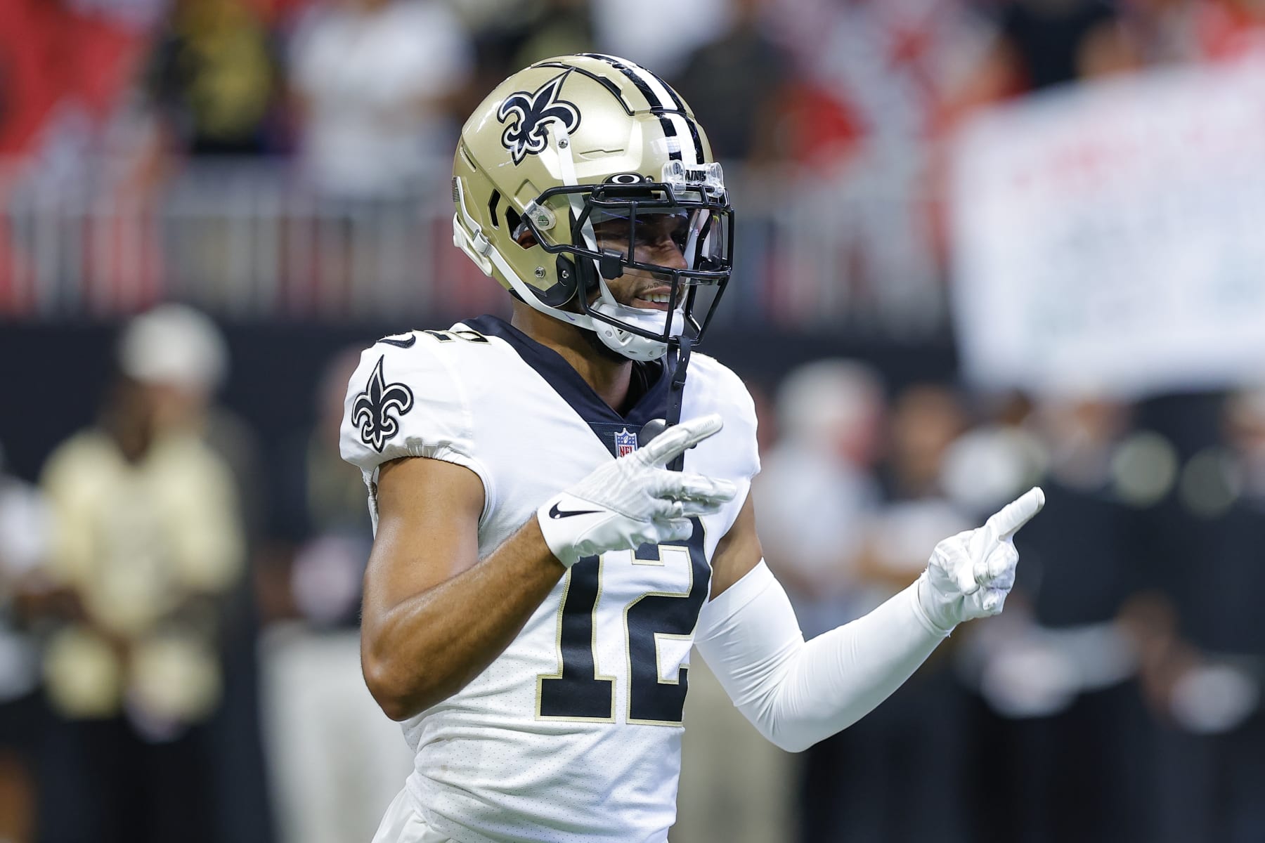 ATLANTA, GA - SEPTEMBER 11: Chris Olave #12 of the New Orleans Saints warms up prior to the game against the Atlanta Falcons at Mercedes-Benz Stadium on September 11, 2022 in Atlanta, Georgia. (Photo by Todd Kirkland/Getty Images)