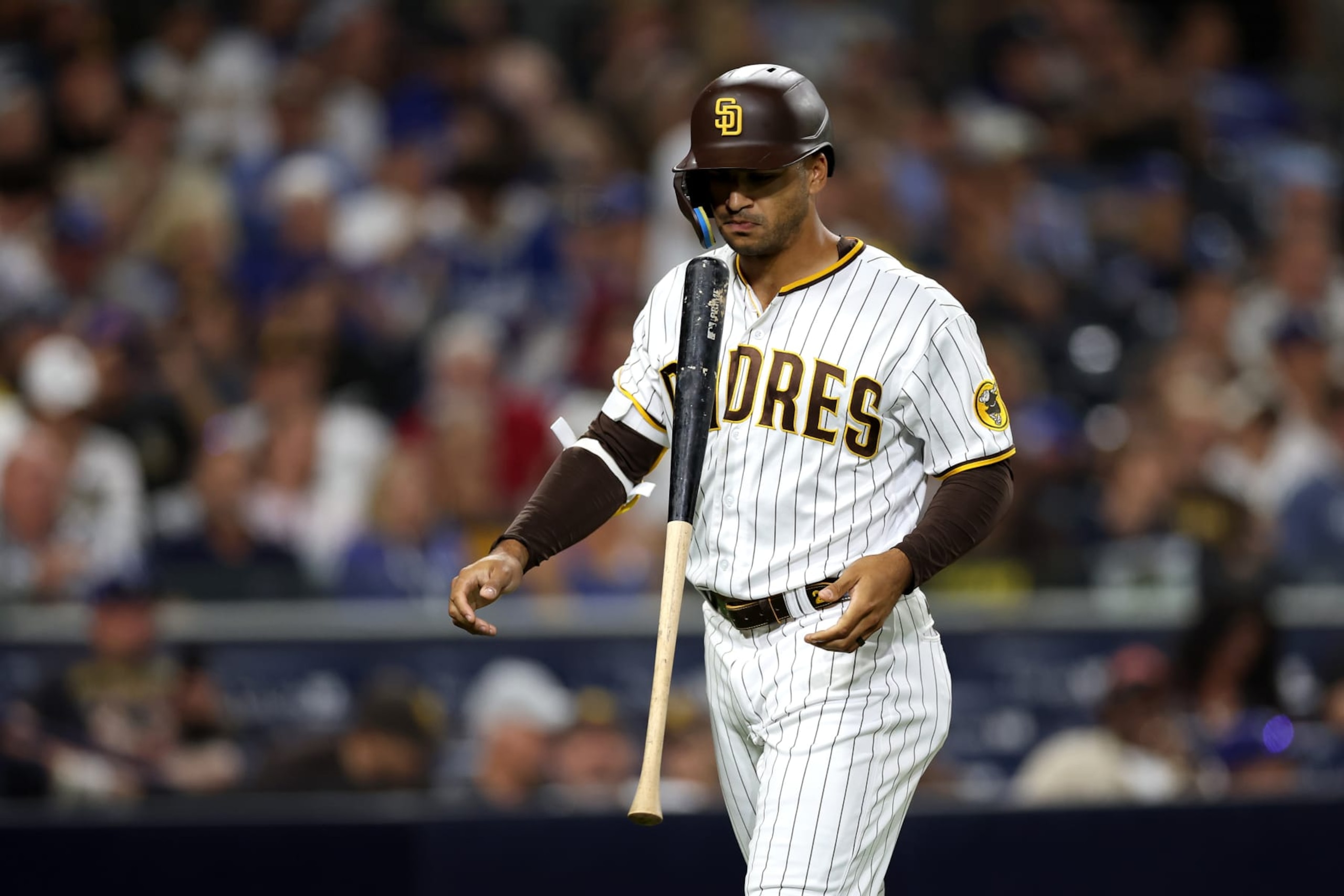 SAN DIEGO, CALIFORNIA - SEPTEMBER 28: Trent Grisham #2 of the San Diego Padres strikes out during the tenth inning of a game against the Los Angeles Dodgers at PETCO Park on September 28, 2022 in San Diego, California. (Photo by Sean M. Haffey/Getty Images)