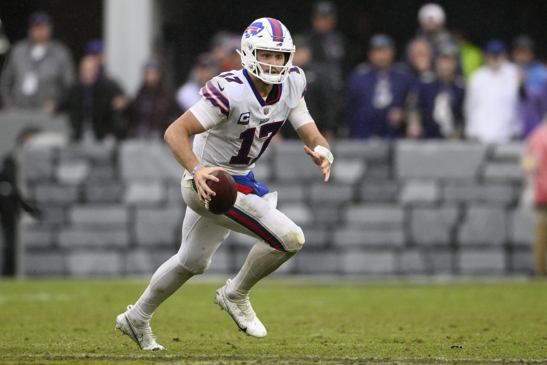 Buffalo Bills quarterback Josh Allen (17) in action during the second half of an NFL football game against the Baltimore Ravens, Sunday, Oct. 2, 2022, in Baltimore. (AP Photo/Nick Wass)