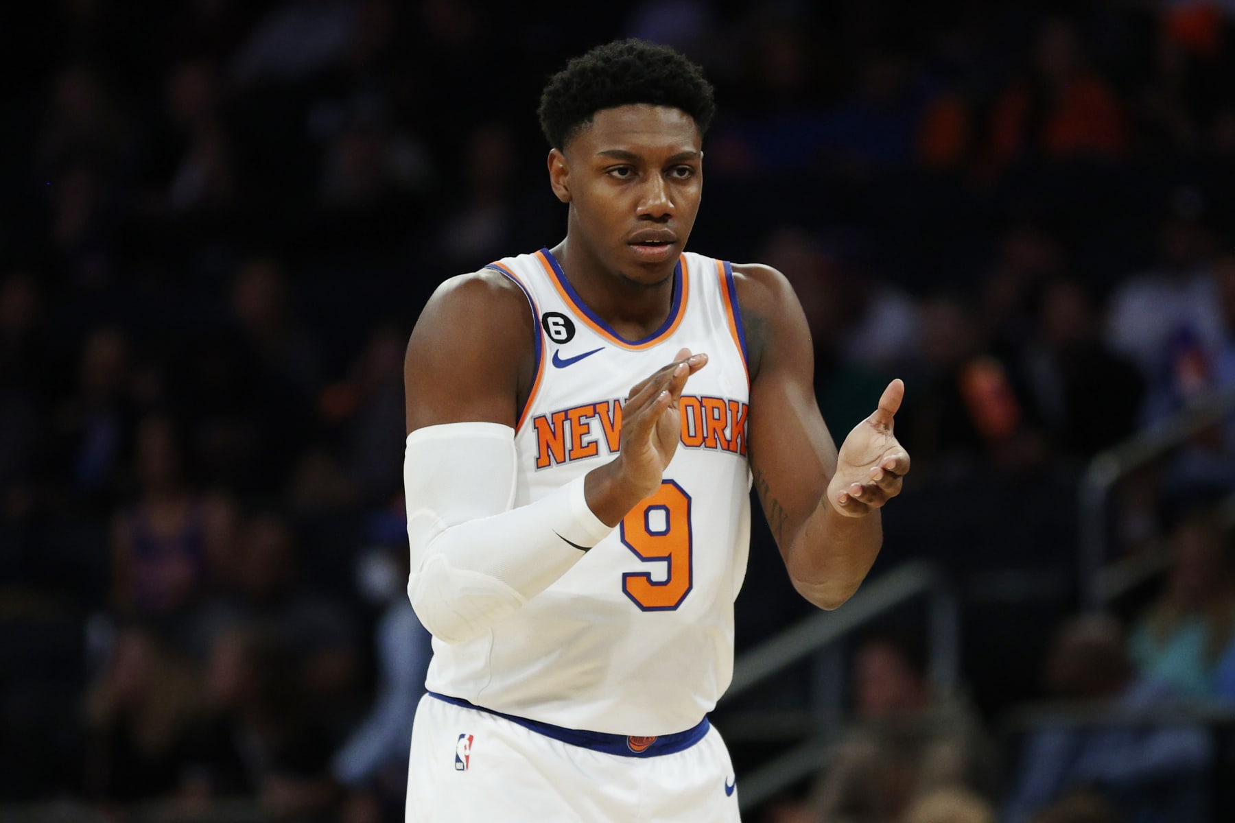 NEW YORK, NEW YORK - OCTOBER 04: RJ Barrett #9 of the New York Knicks reacts during the first half against the Detroit Pistons at Madison Square Garden on October 04, 2022 in New York City. NOTE TO USER: User expressly acknowledges and agrees that, by downloading and or using this photograph, User is consenting to the terms and conditions of the Getty Images License Agreement. (Photo by Sarah Stier/Getty Images)