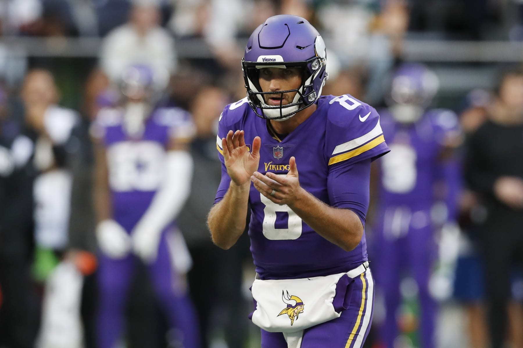 Minnesota Vikings quarterback Kirk Cousins (8) celebrates after scoring a touchdown during an NFL football game against the New Orleans Saints at Tottenham Hotspur Stadium, Sunday, Oct. 2, 2022, in London. (AP Photo/Steve Luciano)