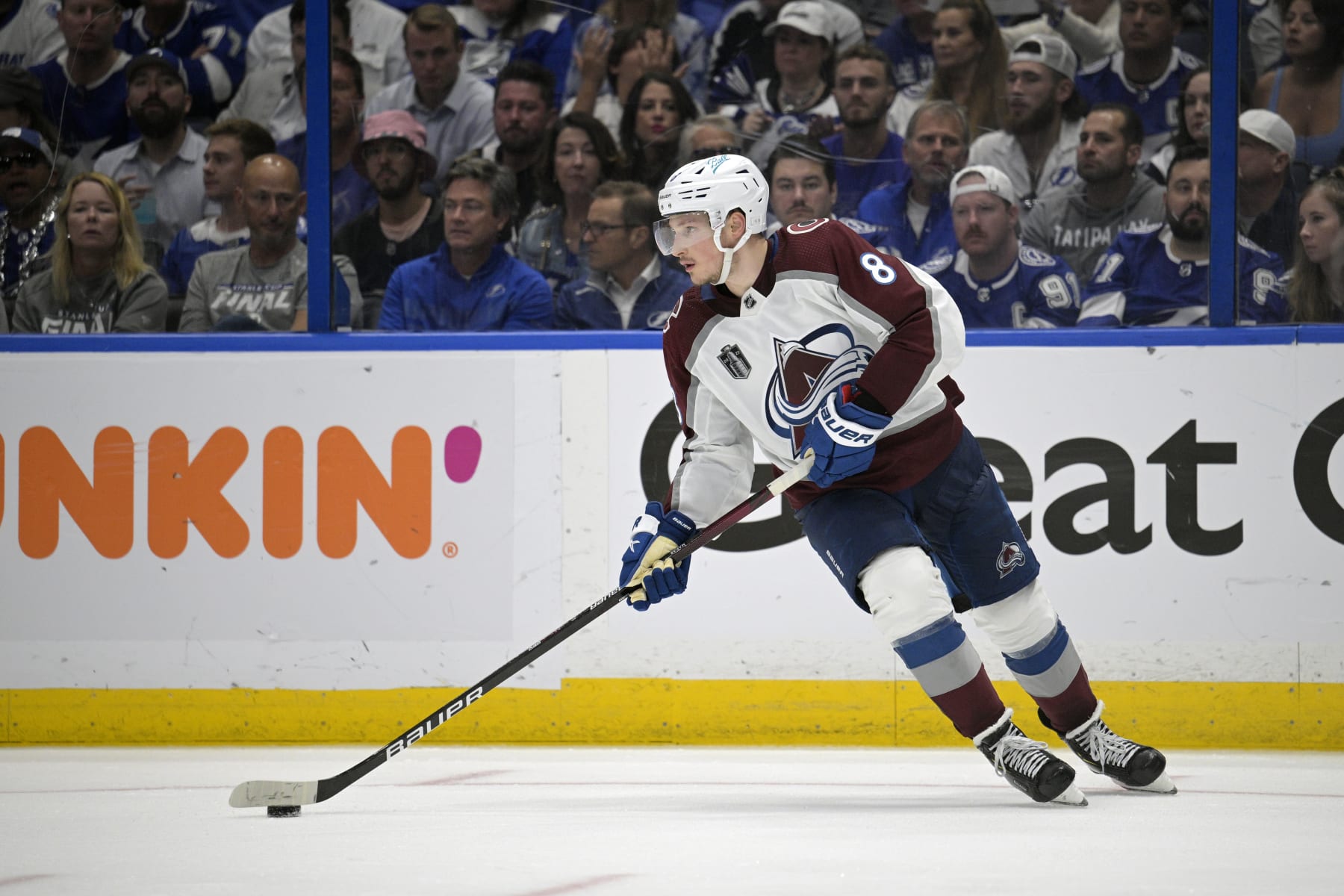 Colorado Avalanche defenseman Cale Makar (8) controls a puck during the third period of Game 6 of the NHL hockey Stanley Cup Finals against the Tampa Bay Lightning on Sunday, June 26, 2022, in Tampa, Fla. (AP Photo/Phelan M. Ebenhack)