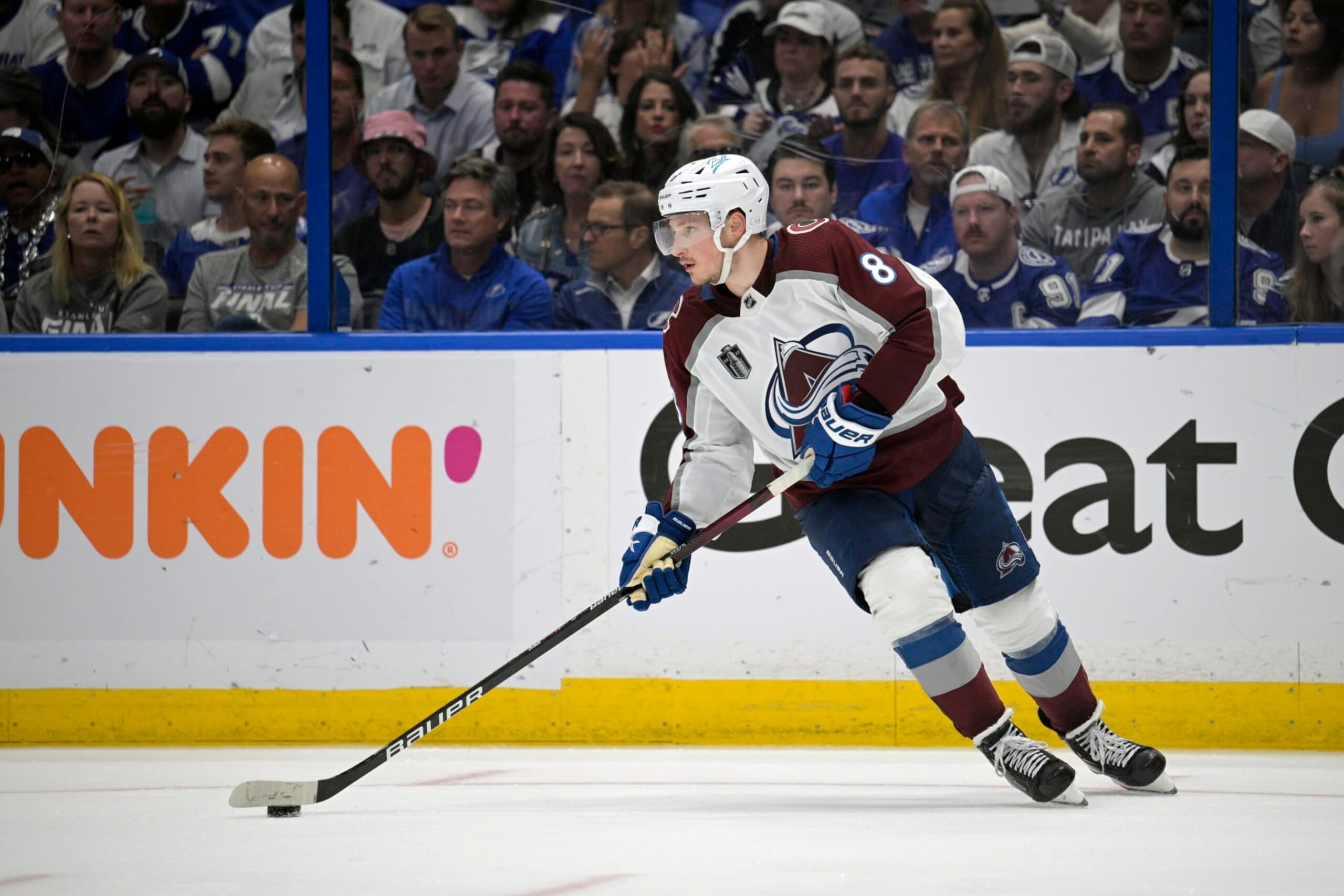 Colorado Avalanche defenseman Cale Makar (8) controls a puck during the third period of Game 6 of the NHL hockey Stanley Cup Finals against the Tampa Bay Lightning on Sunday, June 26, 2022, in Tampa, Fla. (AP Photo/Phelan M. Ebenhack)
