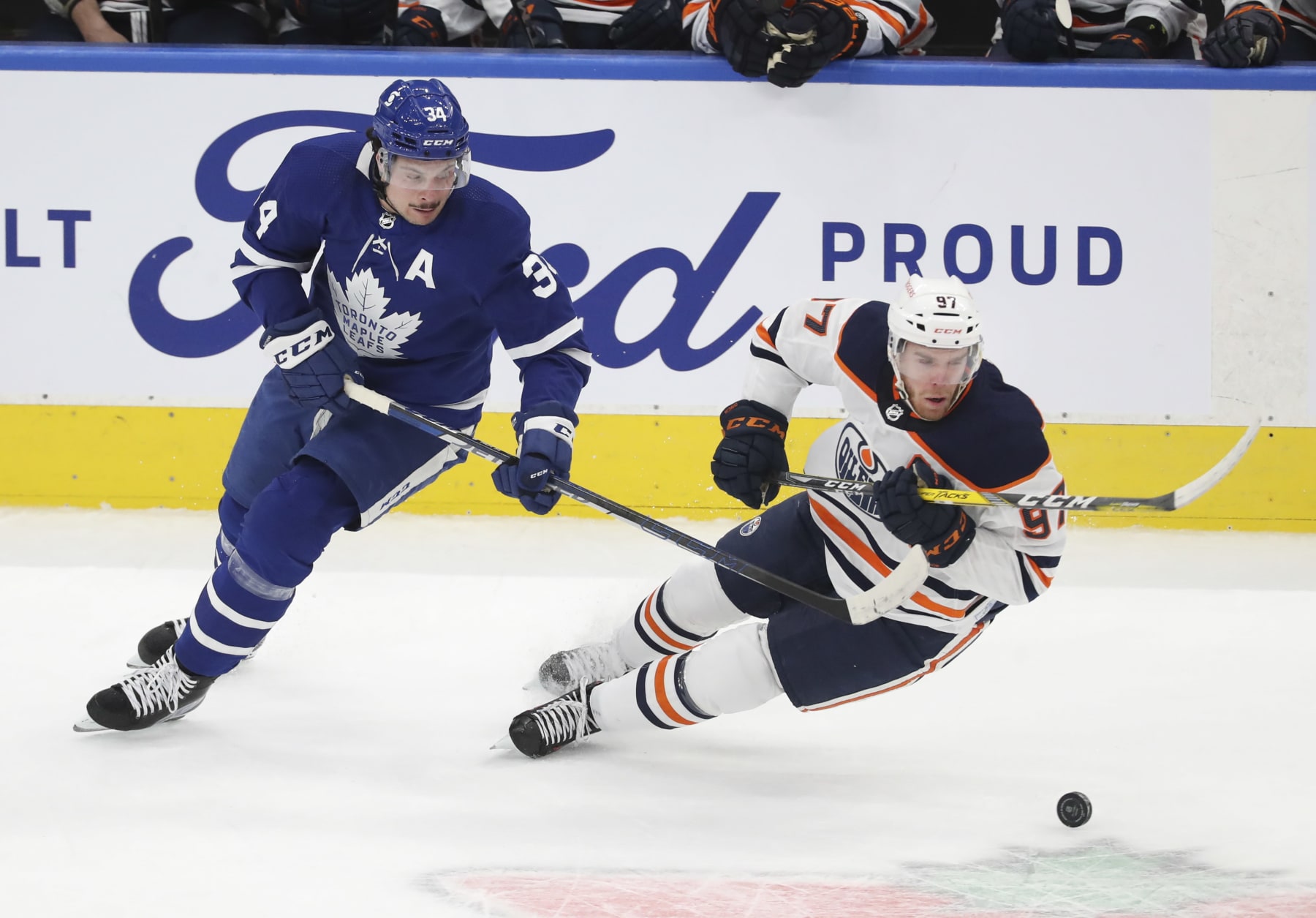 TORONTO, ON - March 29  In first period action, Toronto Maple Leafs center Auston Matthews (34) and Edmonton Oilers center Connor McDavid (97) chase the puck in the Leafs end.
The Toronto Maple Leafs took on the Edmonton Oilers in NHL hockey action at the Scotiabank Arena in Toronto.  
March 29 2021        (Richard Lautens/Toronto Star via Getty Images)
