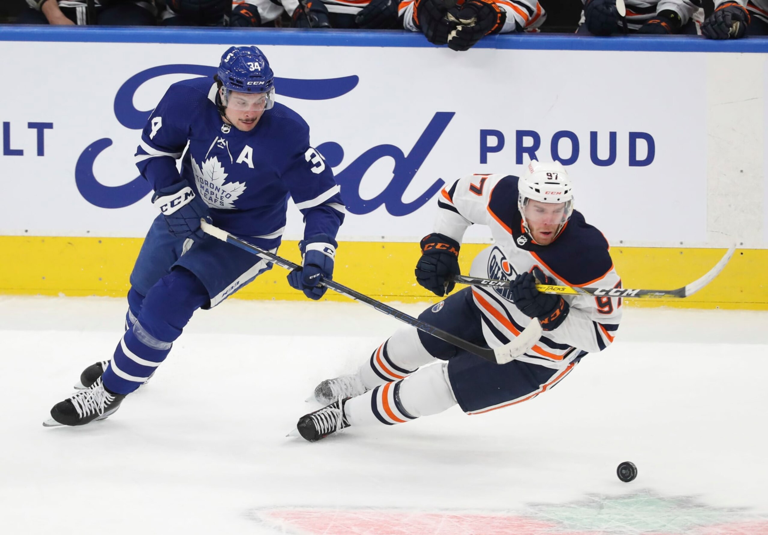 TORONTO, ON - March 29  In first period action, Toronto Maple Leafs center Auston Matthews (34) and Edmonton Oilers center Connor McDavid (97) chase the puck in the Leafs end.
The Toronto Maple Leafs took on the Edmonton Oilers in NHL hockey action at the Scotiabank Arena in Toronto.  
March 29 2021        (Richard Lautens/Toronto Star via Getty Images)