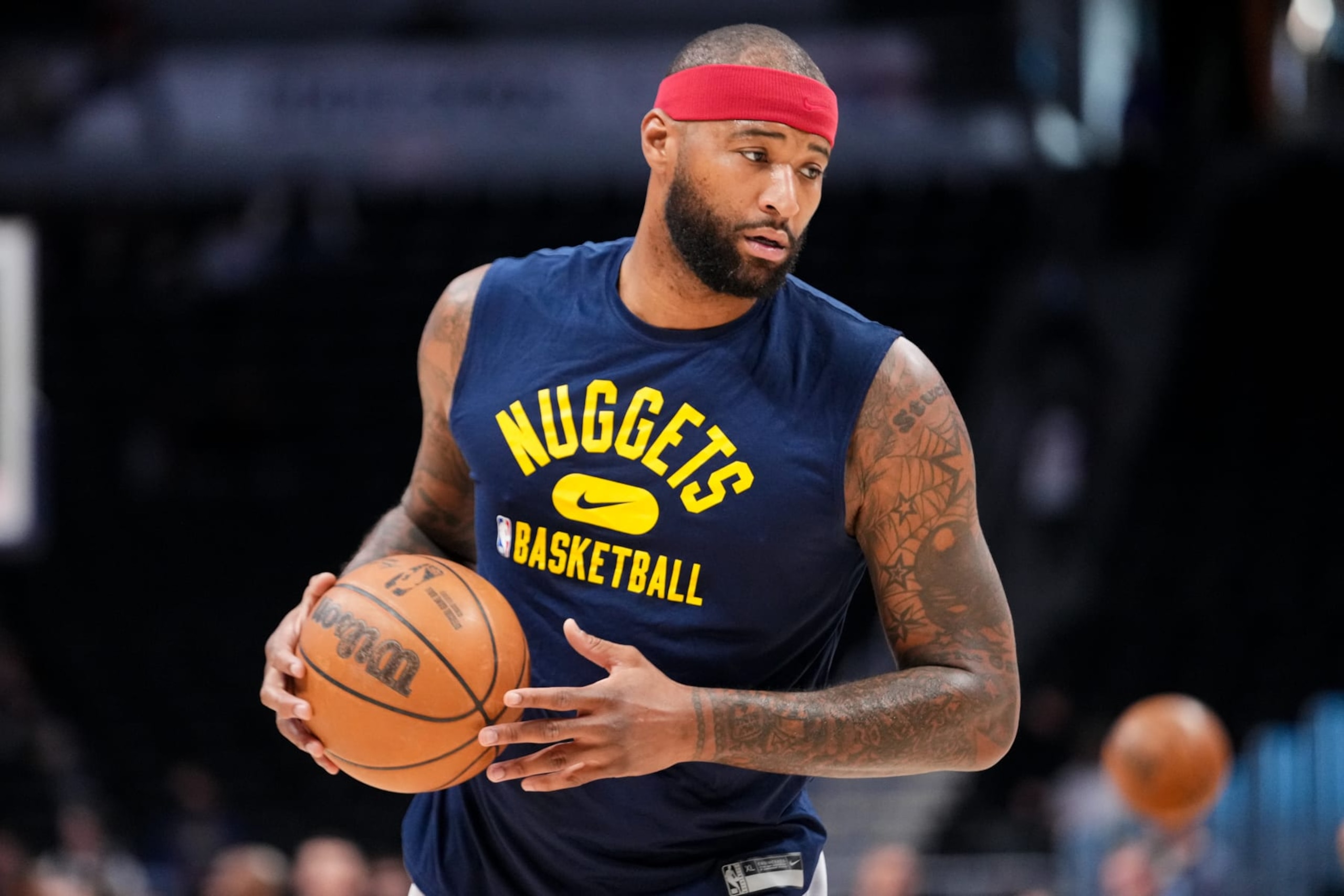 DENVER, CO - APRIL 07: DeMarcus Cousins #4 of the Denver Nuggets warms up before the game against the Memphis Grizzlies at Ball Arena on April 7, 2022 in Denver, Colorado. NOTE TO USER: User expressly acknowledges and agrees that, by downloading and or using this photograph, User is consenting to the terms and conditions of the Getty Images License Agreement. (Photo by Ethan Mito/Clarkson Creative/Getty Images)