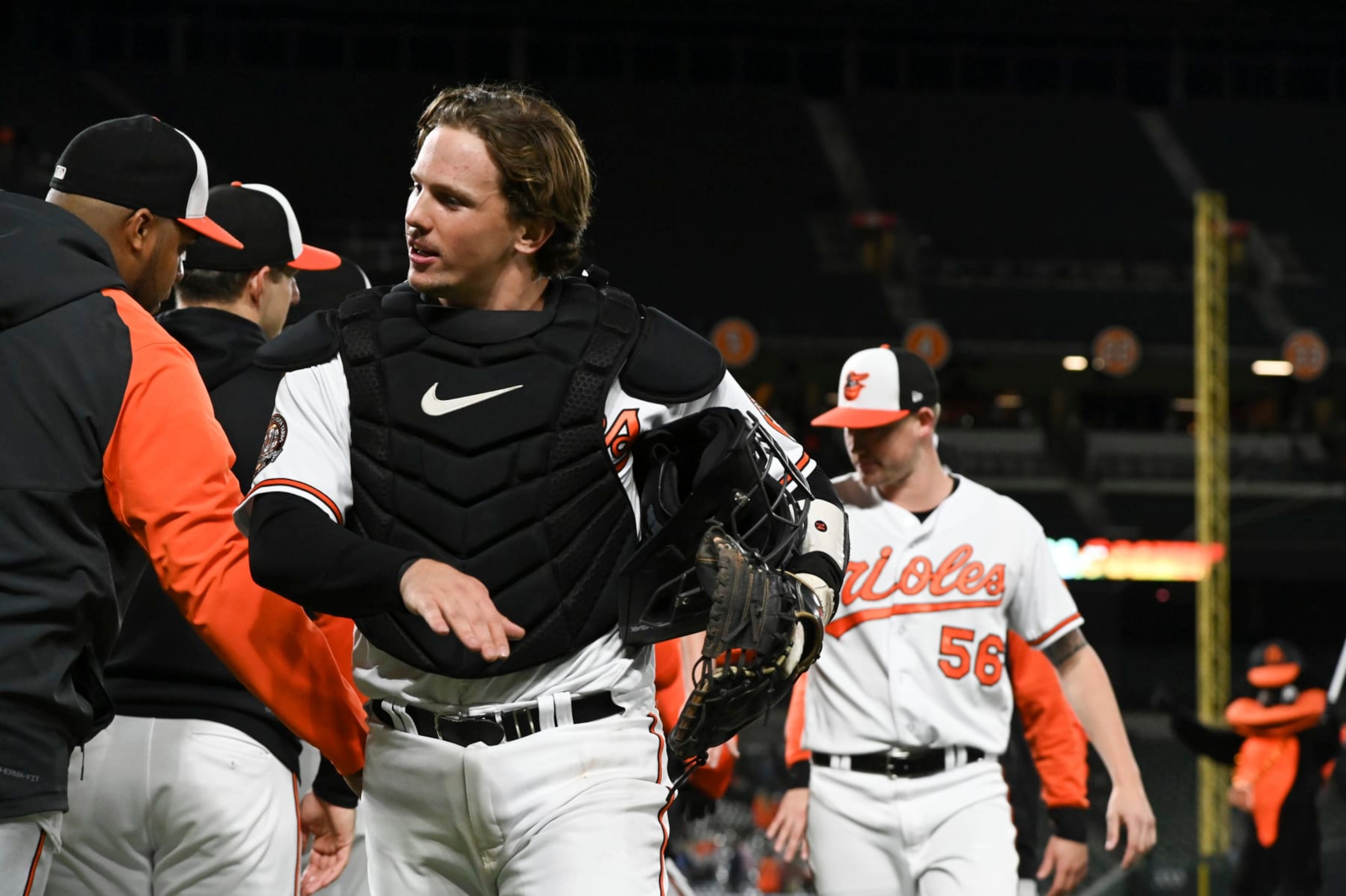 Baltimore Orioles' Adley Rutschman celebrates with teammates after the team's 2-0 win against the Houston Astros in a baseball game Thursday, Sept. 22, 2022, in Baltimore. (AP Photo/Tommy Gilligan)