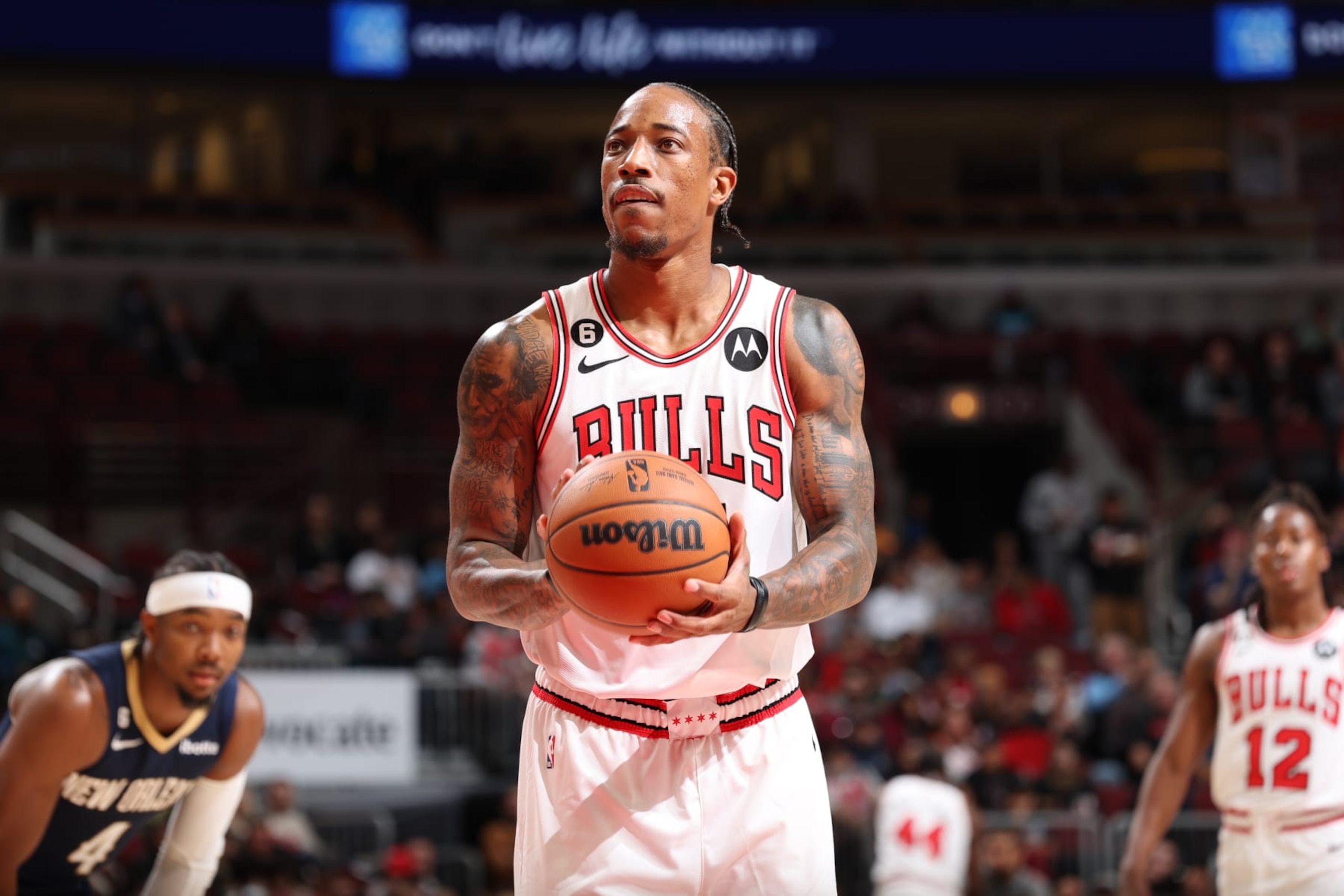 CHICAGO, IL - OCTOBER 4: DeMar DeRozan #11 of the Chicago Bulls shoots a free throw during the game against the New Orleans Pelicans on October 4, 2022 at United Center in Chicago, Illinois. NOTE TO USER: User expressly acknowledges and agrees that, by downloading and or using this photograph, User is consenting to the terms and conditions of the Getty Images License Agreement. Mandatory Copyright Notice: Copyright 2022 NBAE (Photo by Jeff Haynes/NBAE via Getty Images)