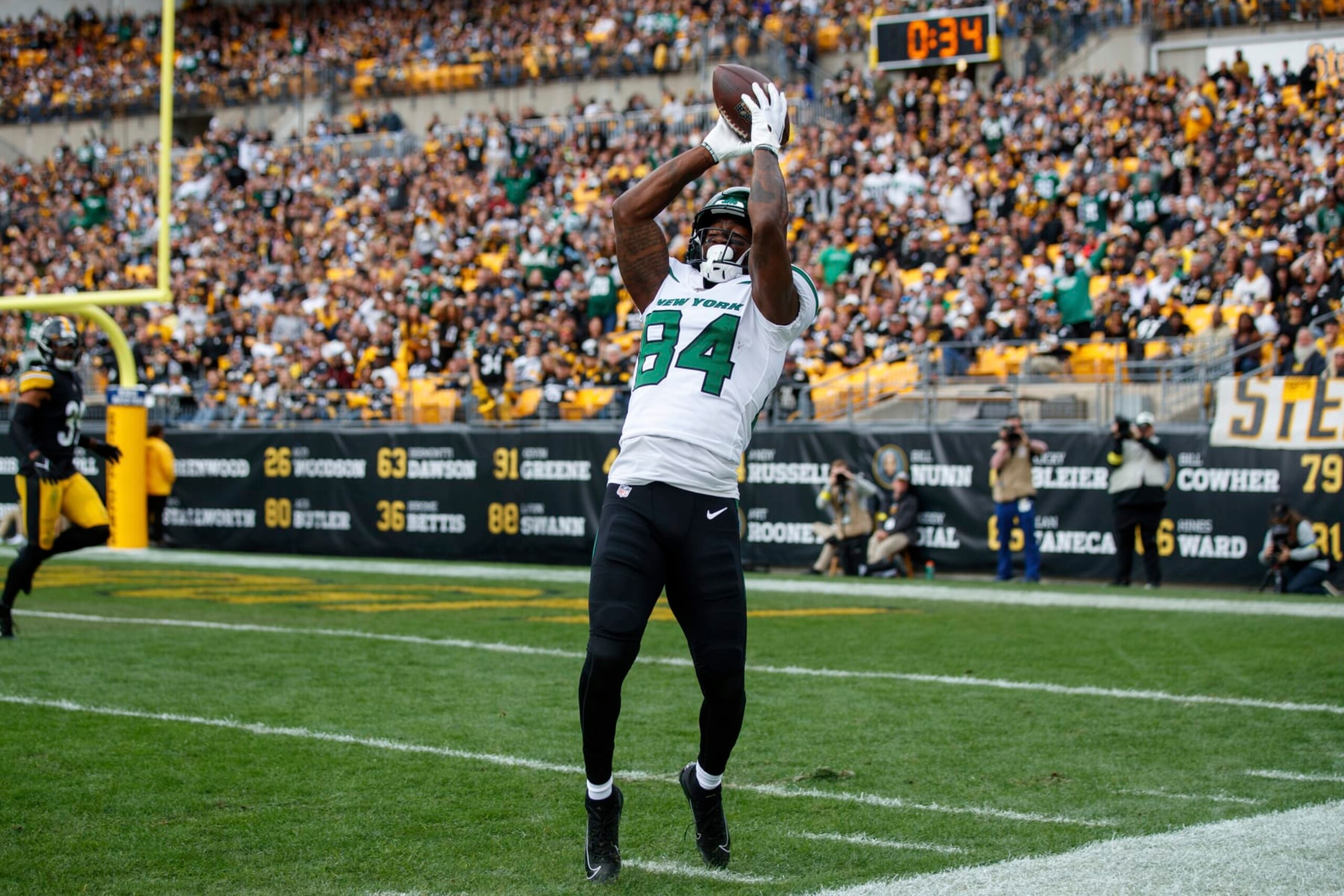 New York Jets wide receiver Corey Davis (84) attempts to catch a pass during an NFL football game, Sunday, Oct. 2, 2022, in Pittsburgh, PA. (AP Photo/Matt Durisko)
