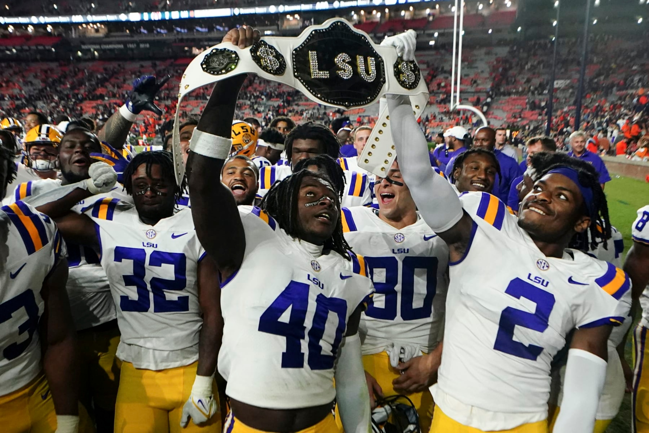 LSU players celebrate after defeating Auburn in an NCAA college football game, Saturday, Oct. 1, 2022, in Auburn, Ala. (AP Photo/John Bazemore) LSU players celebrate after defeating Auburn in an NCAA college football game, Saturday, Oct. 1, 2022, in Auburn, Ala. (AP Photo/John Bazemore)