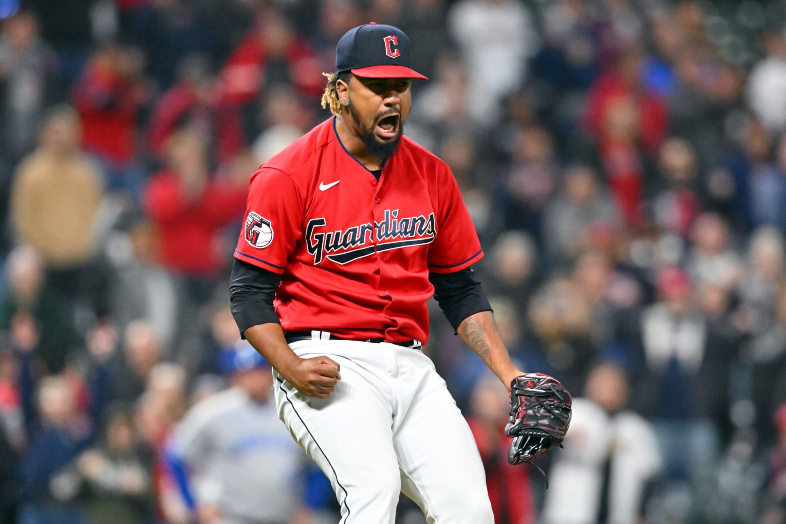 CLEVELAND, OHIO - OCTOBER 04: Closing pitcher Emmanuel Clase #48 of the Cleveland Guardians celebrates after the last out against the Kansas City Royals at Progressive Field on October 04, 2022 in Cleveland, Ohio. The Guardians defeated the Royals 5-3.  (Photo by Jason Miller/Getty Images)