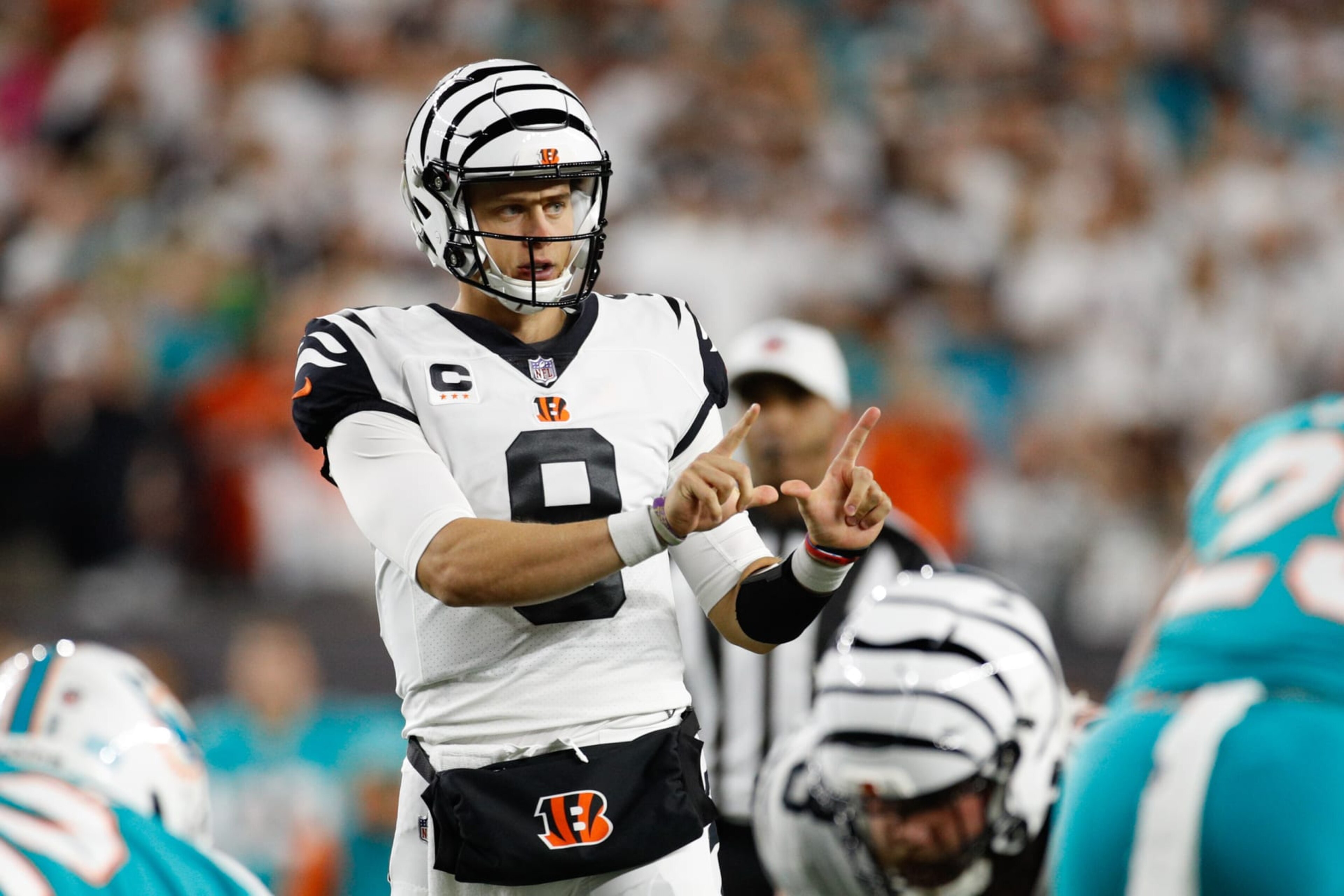 CINCINNATI, OH - SEPTEMBER 29: Cincinnati Bengals quarterback Joe Burrow (9) calls a play during the game against the Miami Dolphins and the Cincinnati Bengals on September 29, 2022, at Paycor Stadium in Cincinnati, OH. (Photo by Ian Johnson/Icon Sportswire via Getty Images) CINCINNATI, OH - SEPTEMBER 29: Cincinnati Bengals quarterback Joe Burrow (9) calls a play during the game against the Miami Dolphins and the Cincinnati Bengals on September 29, 2022, at Paycor Stadium in Cincinnati, OH. (Photo by Ian Johnson/Icon Sportswire via Getty Images)