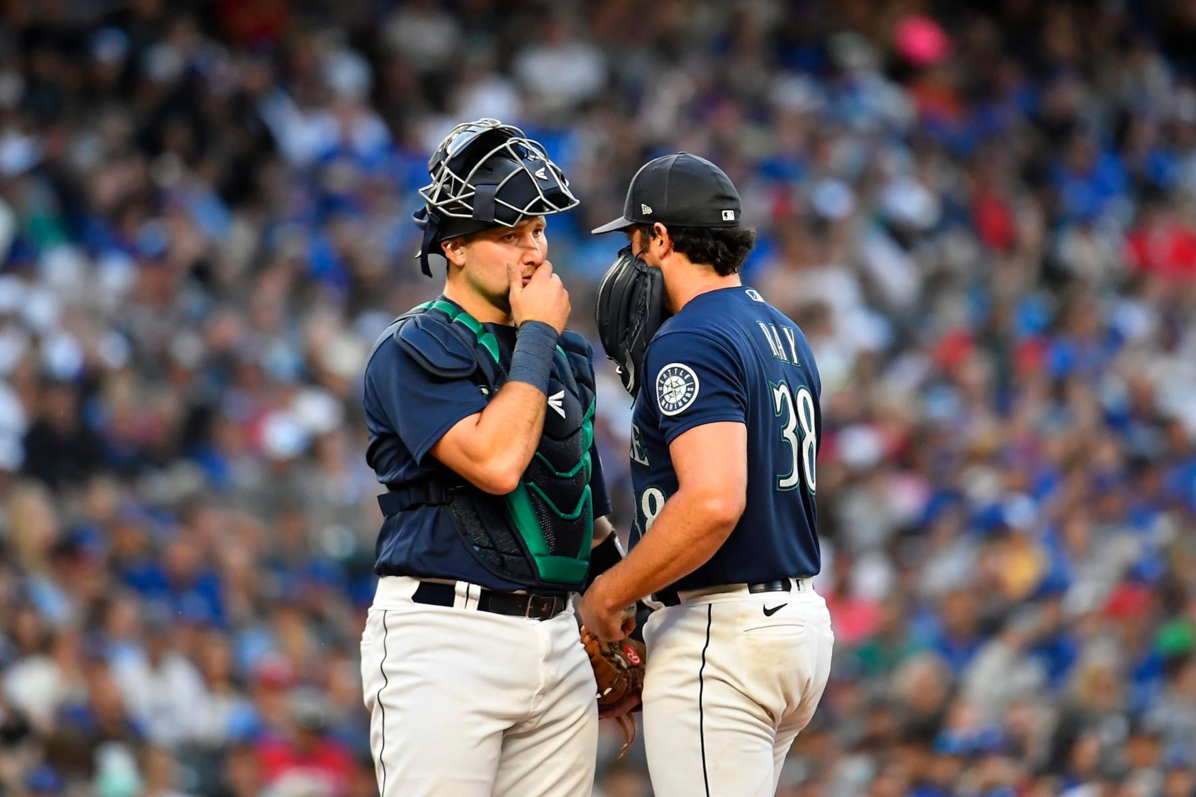 SEATTLE, WASHINGTON - JULY 09: Cal Raleigh #29 of the Seattle Mariners and Robbie Ray #38 meet at the mound during the fifth inning against the Toronto Blue Jays at T-Mobile Park on July 09, 2022 in Seattle, Washington. (Photo by Alika Jenner/Getty Images) SEATTLE, WASHINGTON - JULY 09: Cal Raleigh #29 of the Seattle Mariners and Robbie Ray #38 meet at the mound during the fifth inning against the Toronto Blue Jays at T-Mobile Park on July 09, 2022 in Seattle, Washington. (Photo by Alika Jenner/Getty Images)